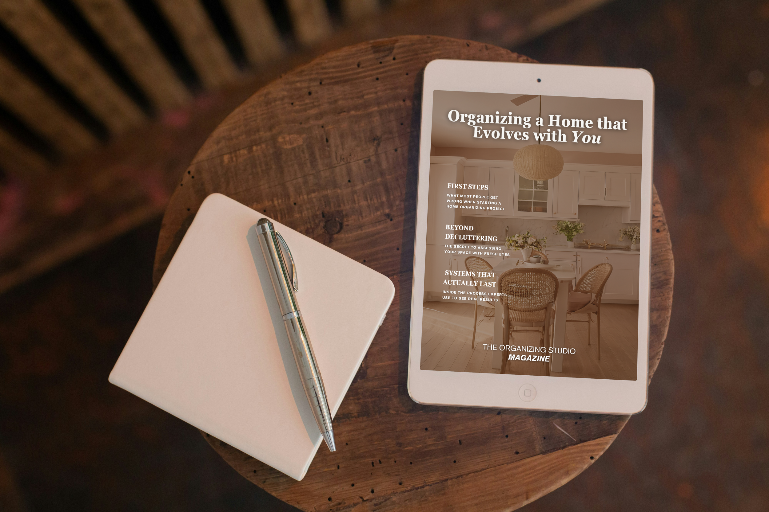 Professional home organizing magazine displayed on a tablet, showcasing a serene, well-designed kitchen and intentional organizing systems in Los Angeles, CA.