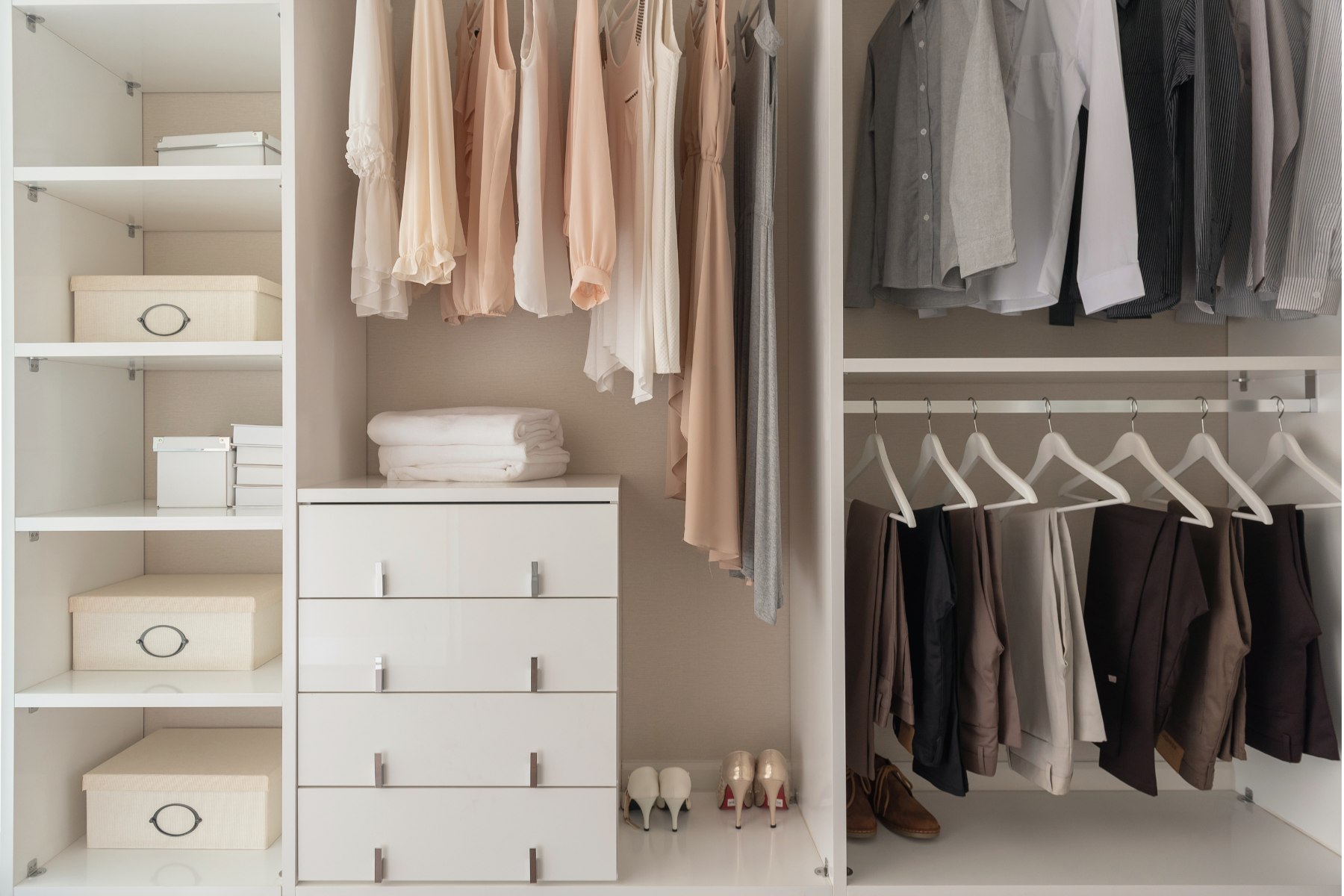 A thoughtfully organized closet with clothing, storage boxes, and folded linens, representing a seasonal Refresher Day.