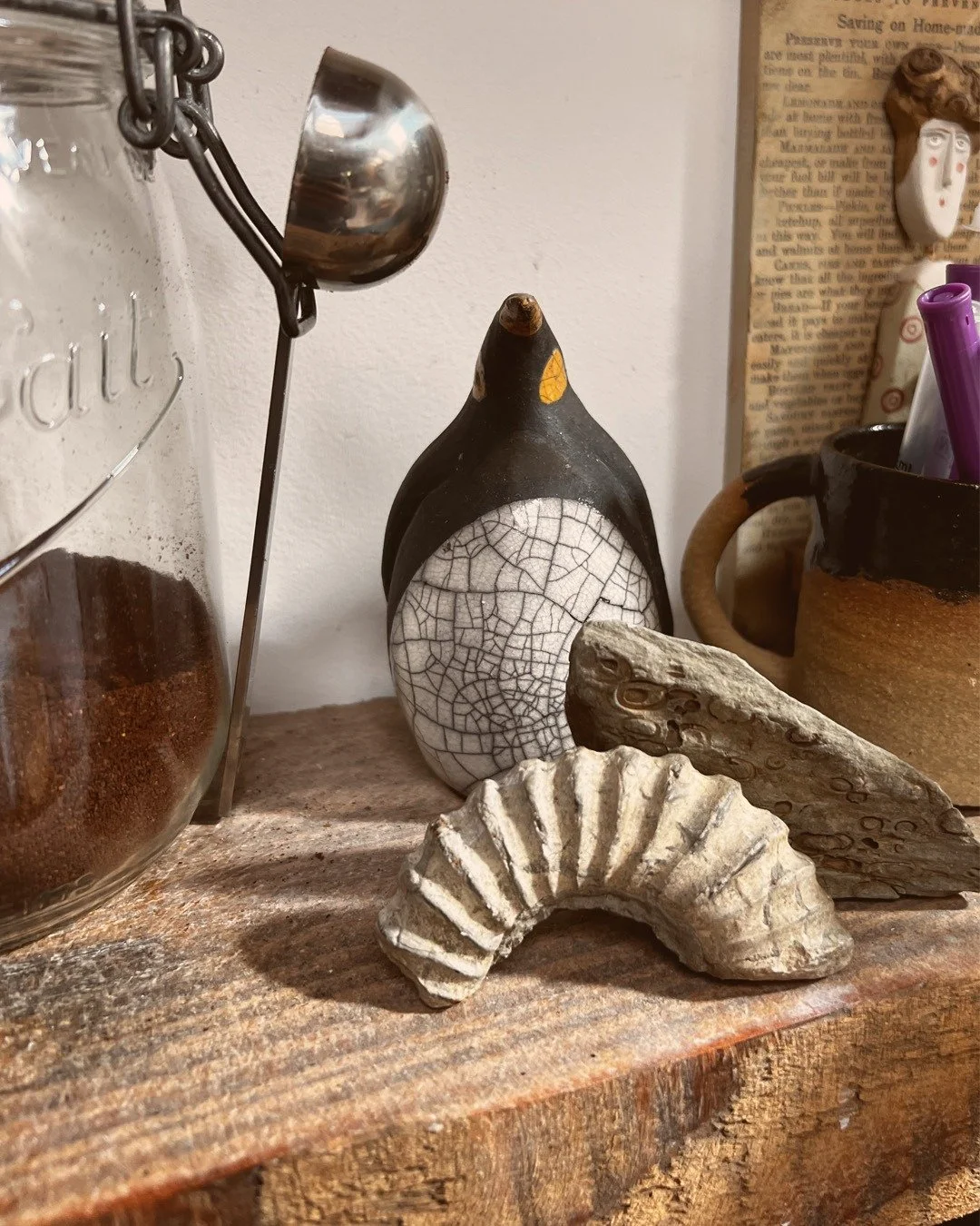 It&rsquo;s funny how life settles. Things gather on a shelf: the beautiful and the useful. A fossil, ground coffee, and white-crackle glaze. As architects, we&rsquo;re always chasing that interplay of texture and natural light. And yes... we&rsquo;re