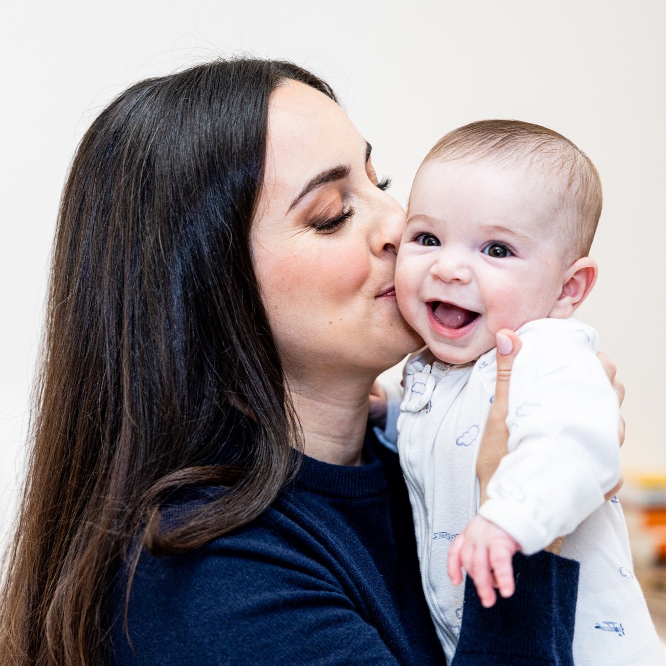 A smooch for baby, a smooch for mommy