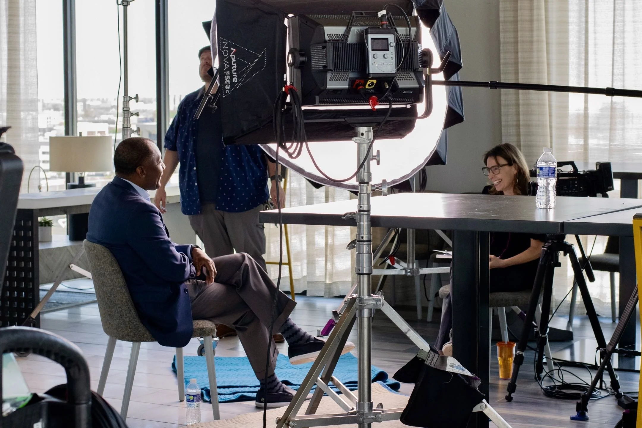Behind the scenes still from the film, Tom Lee Park: A Riverfront for Everyone, produced by Last Bite Films. Image features producer Molly Wexler conducting an interview.