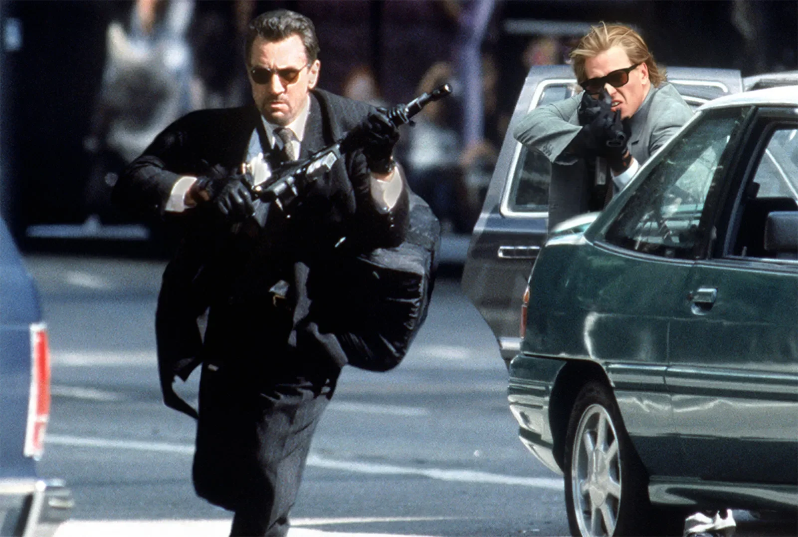 Publicity-still-from-the-1995-film-Heat-starring-Al-Pacino-Lieutenant-VIncent-Hanna-Robert-De-Niro-Master-criminal-Neil-McCauley-and-Val-Kilmer-Chris-Shiherlis-Heist-action-crime-thriller-detective-fiction-action-movie.jpg.webp