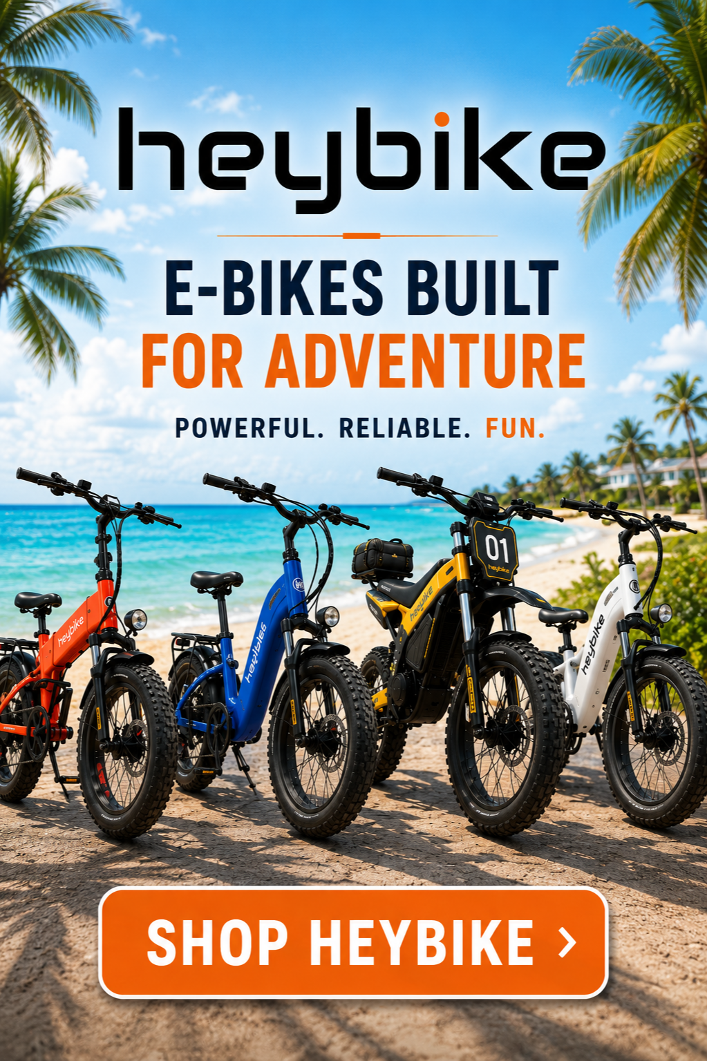 Four Heybike electric bikes in orange, blue, yellow, and white parked on sandy beach with palm trees, ocean, and blue sky in background, promotional ad for Heybike marketed for adventure and fun.