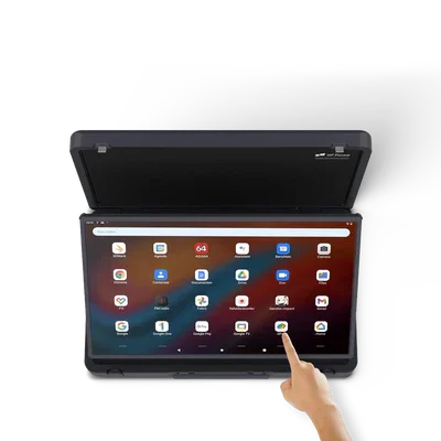 A person touching the screen of a black tablet computer with a hinge, displaying various app icons on its screen, placed on a white surface.