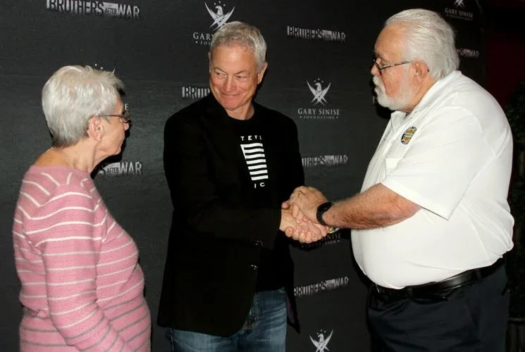 Cindy Krejsa, Gary Sinise and Rich Krejsa, president of Vietnam Veterans of America Chapter 1140 in Franklin during a meet and greet prior to the premiere of the documentary film, Brothers After War.