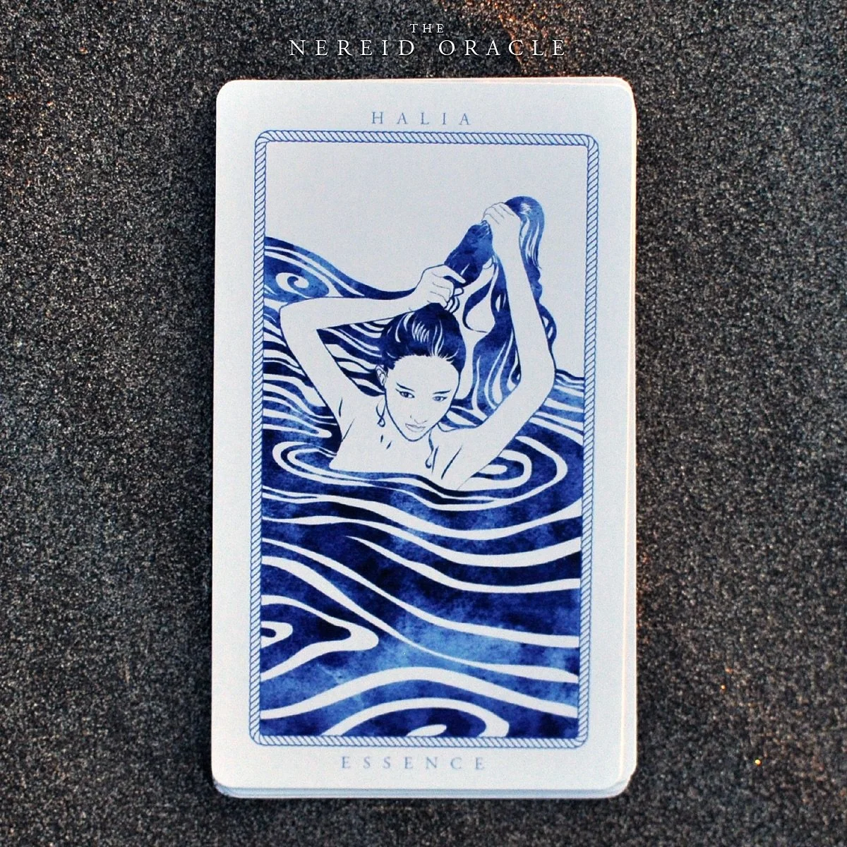 Halia &bull;&nbsp;Essence &nbsp;&bull;&nbsp;A card from the Nereid Oracle deck.
&ldquo;Answers lie inside of us, like a glittering pearl hidden within the mollusk. Witness how the spiral in the whorl of your fingertip mirrors the shape of galaxies&rd