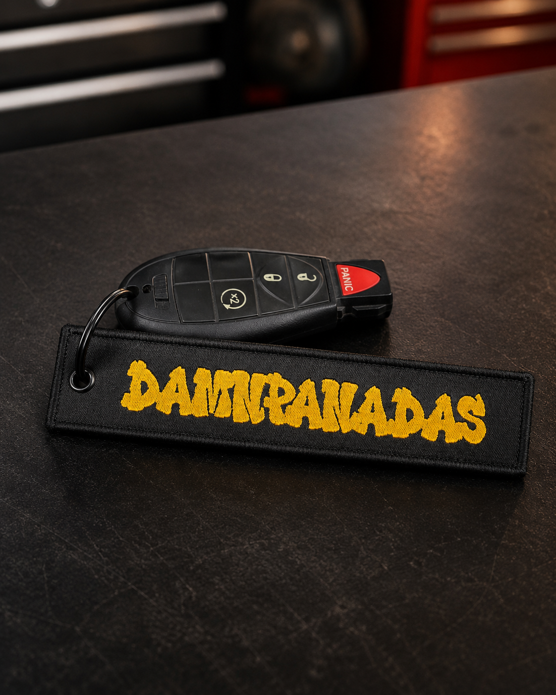 Image of Damnpanadas Jet Tag attached to a key chain as an example