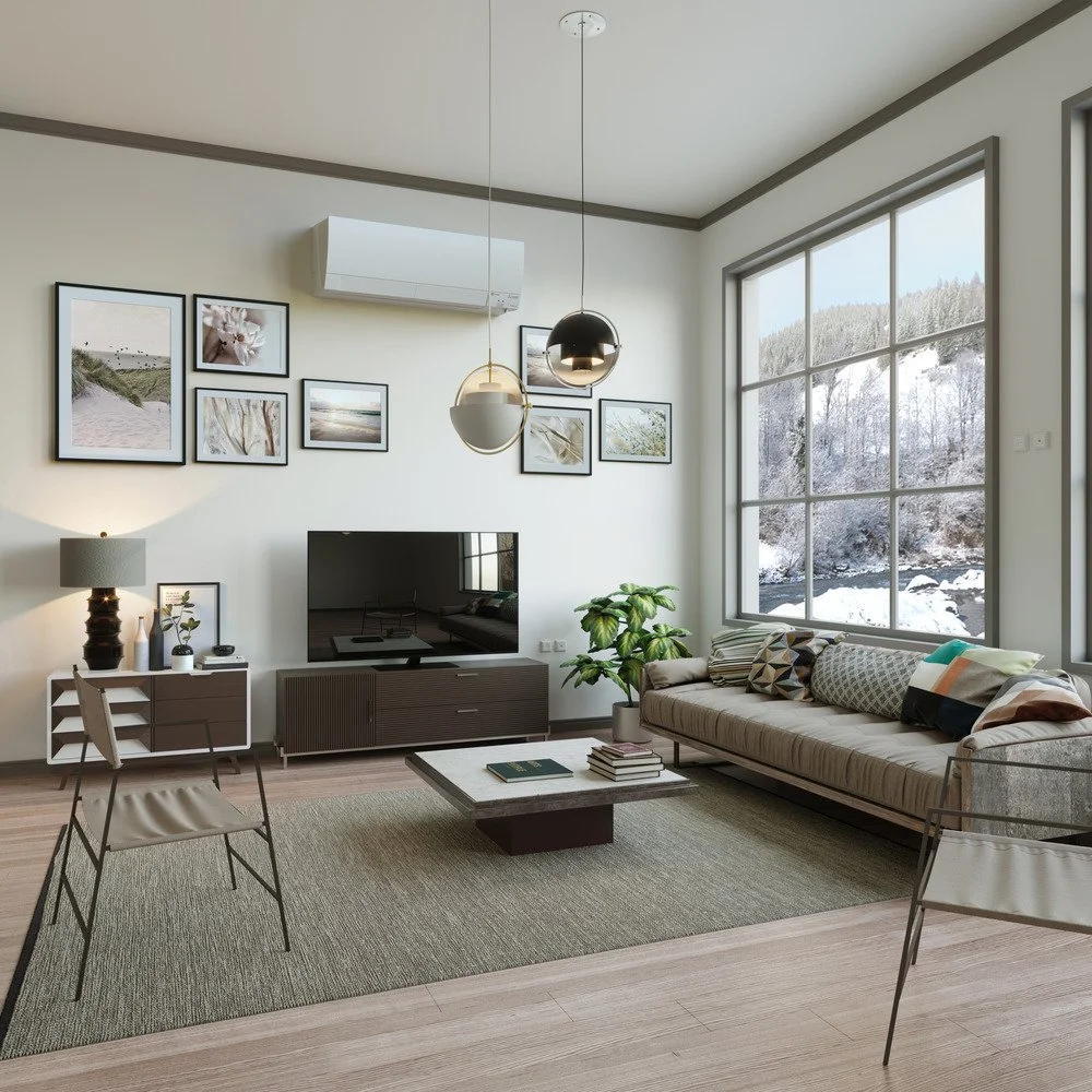 Ductless heat pump installed in a Southern Maine living room to provide heating and cooling alongside an existing heating system.