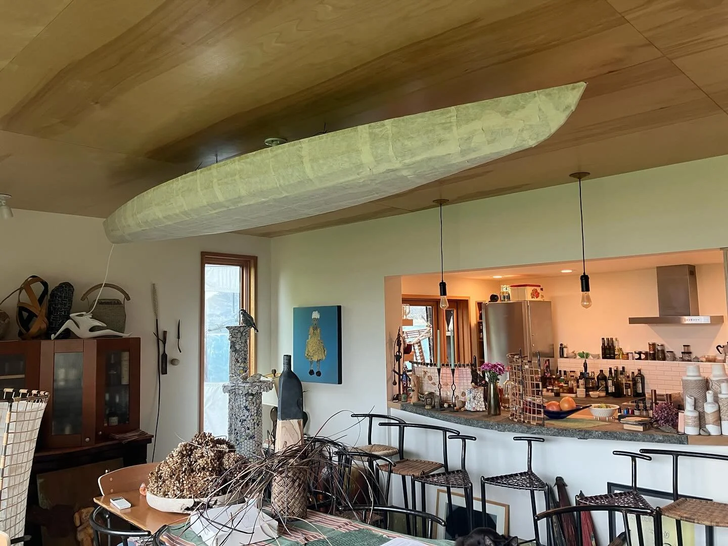 Kayak form with mulberry paper and LED lights. Quite the mood-setter. 
#lighting #decor #interiordesign #papercraft #overheadlighting #dining #kayak #chandellier #led #studio #mulberrypaper