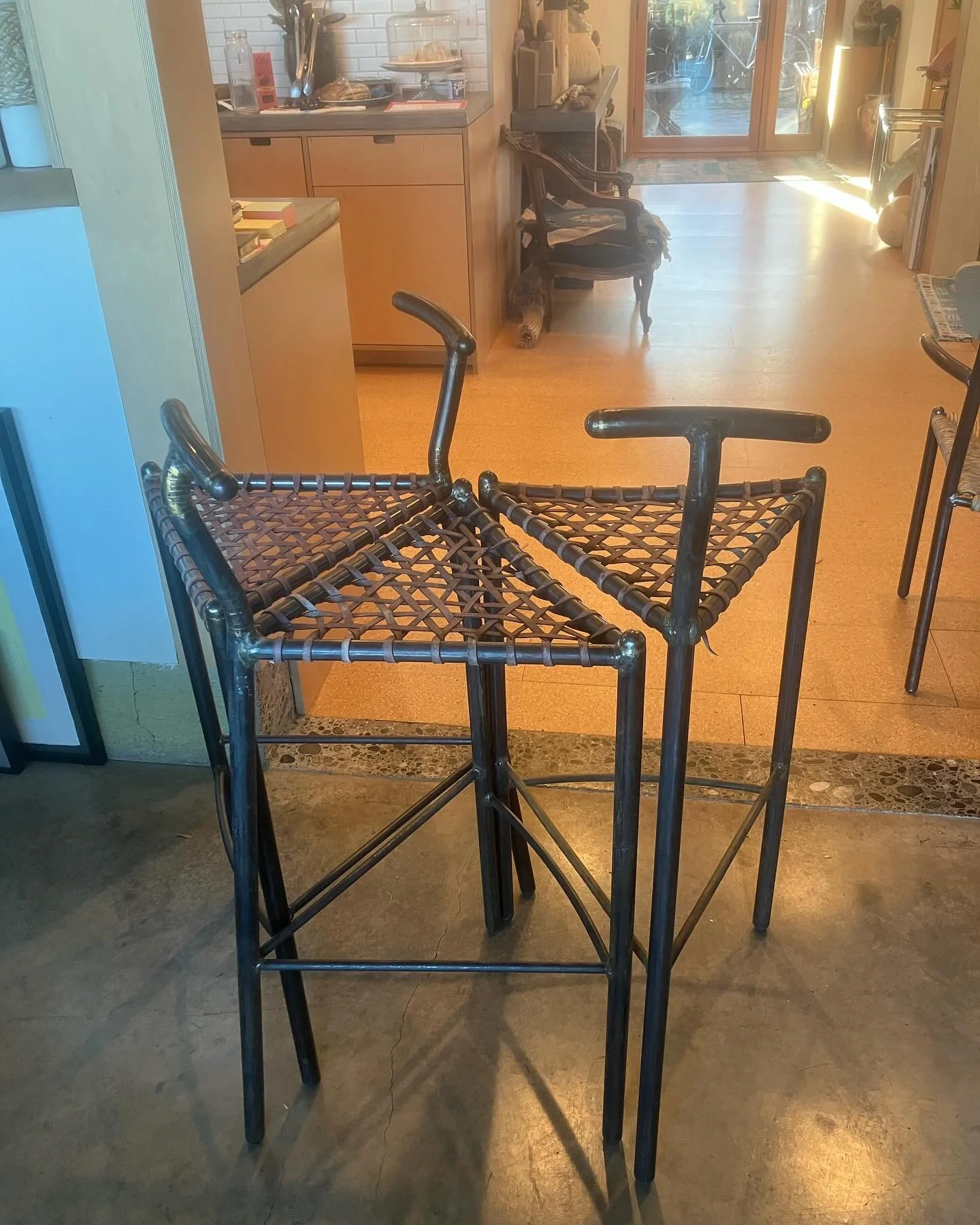 Our newest chair design- A 3-legged stool that we are calling the Interlocutor because it lends itself to intimate conversation. Fun features being the seatback/handle and woven rawhide seat. 
Keep a lookout for our whole collection being introduced