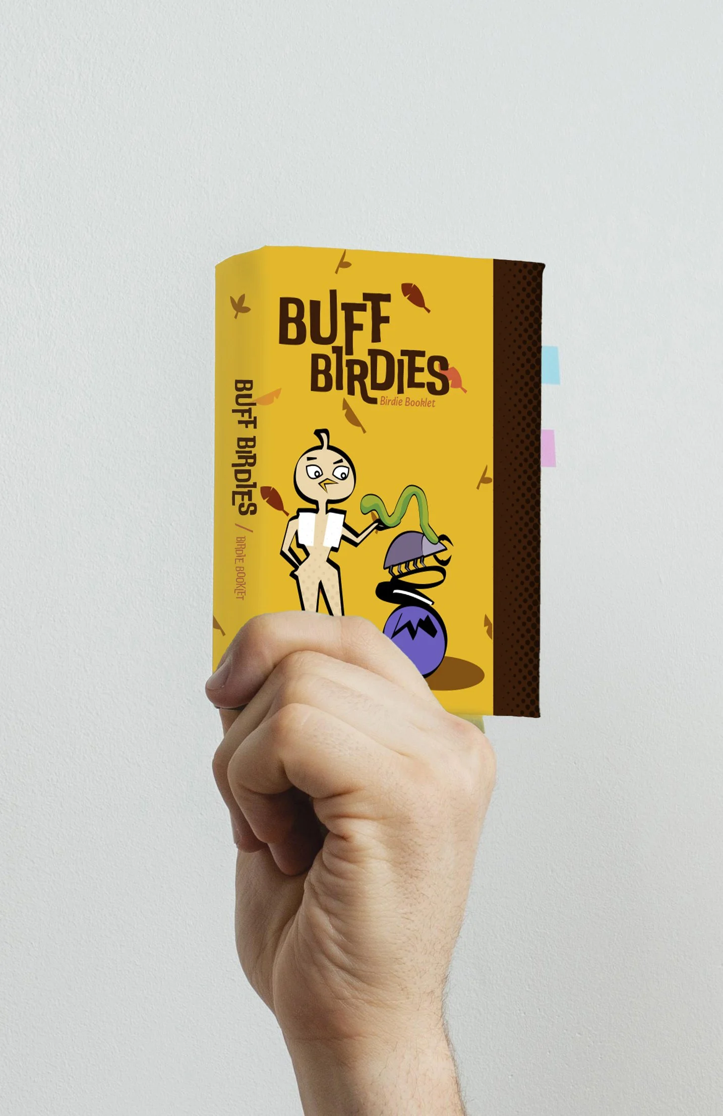 holdingBOOKLET.jpg