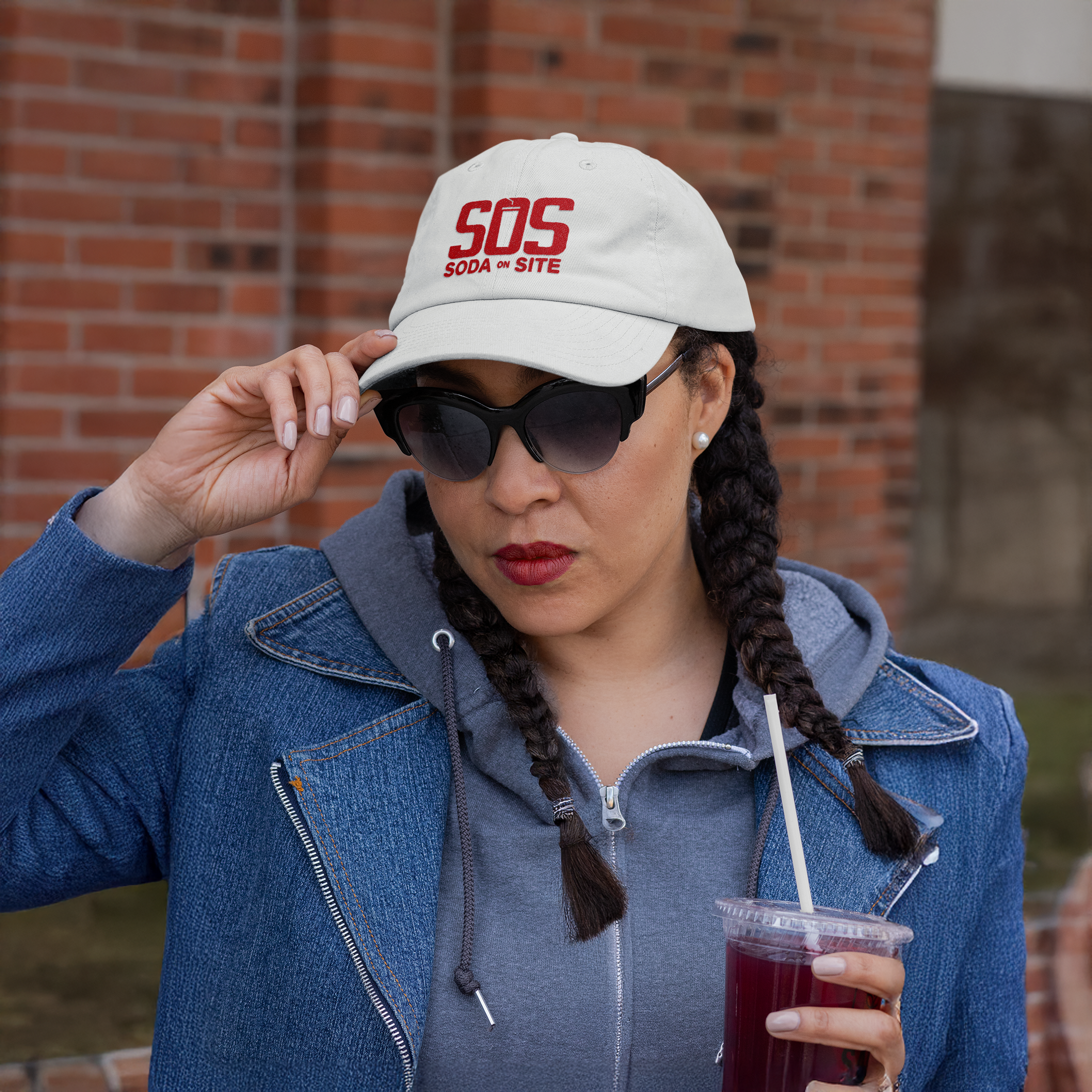 dad-hat-mockup-featuring-a-woman-with-a-drink-on-her-hand-32430 (1).png