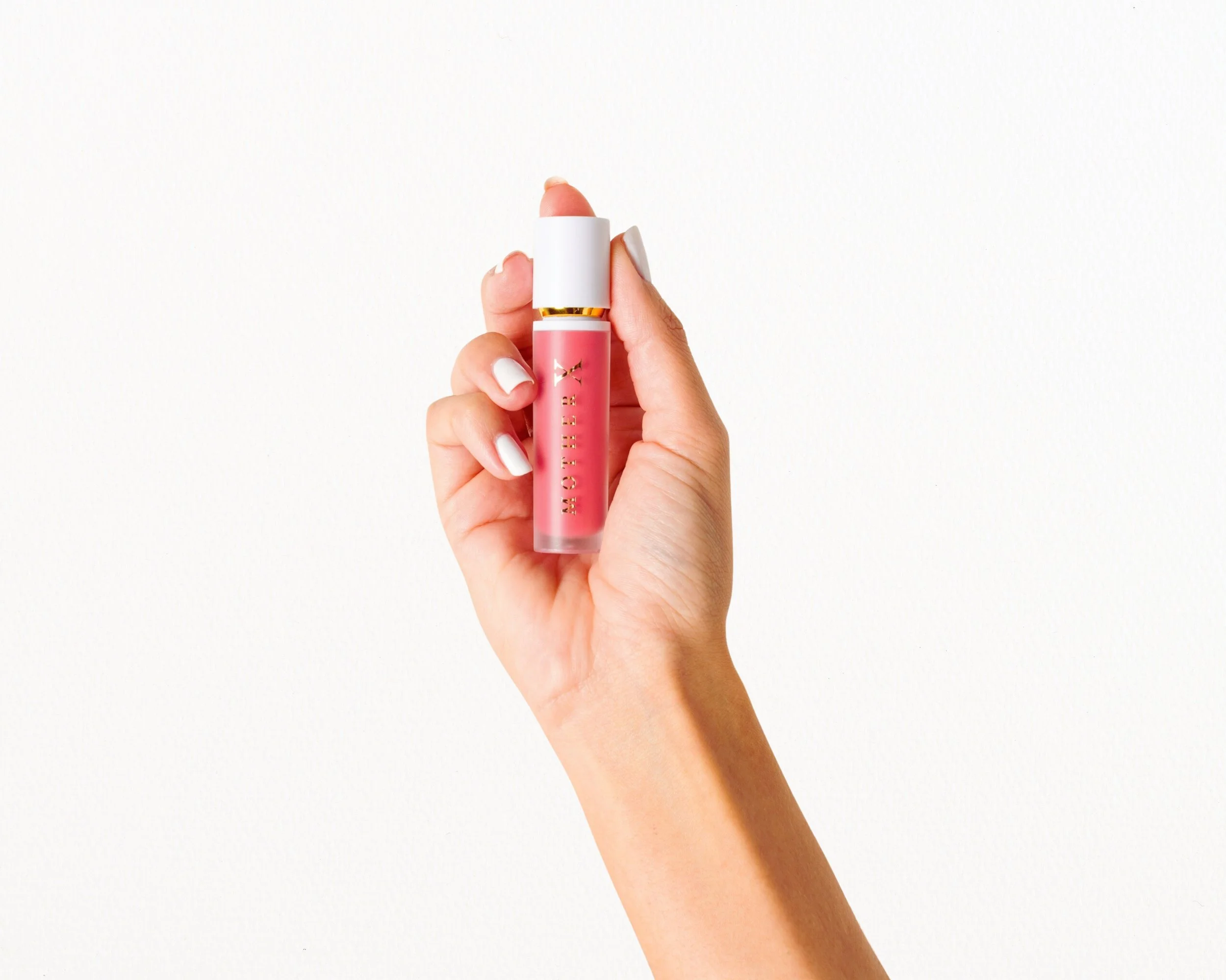 Worker operating machinery in a wood manufacturing facility, handling large stacks of plywood sheets.