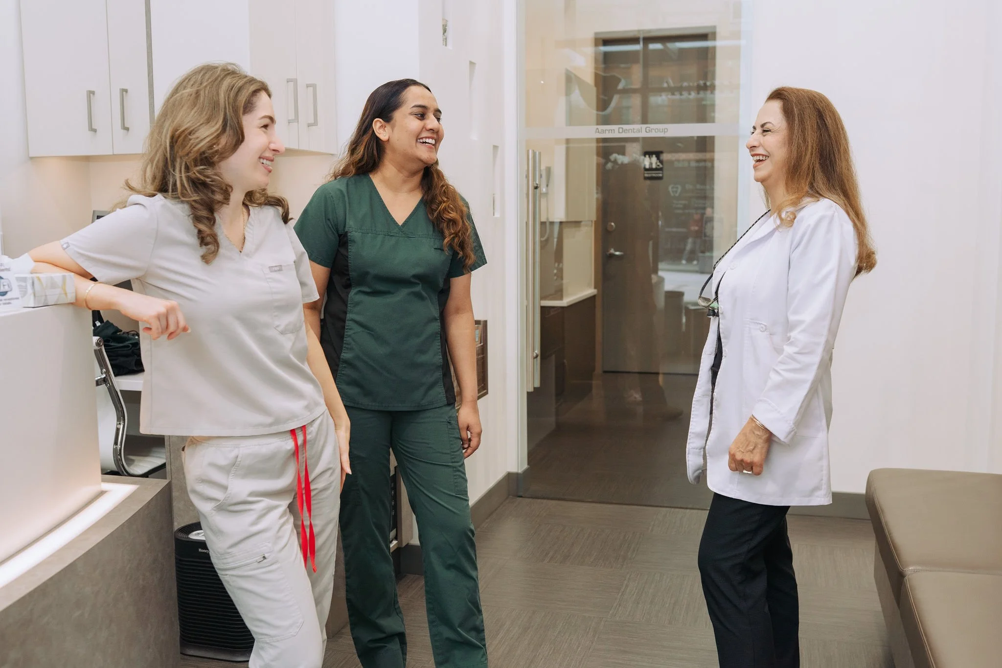 Picture of a dental team smiling