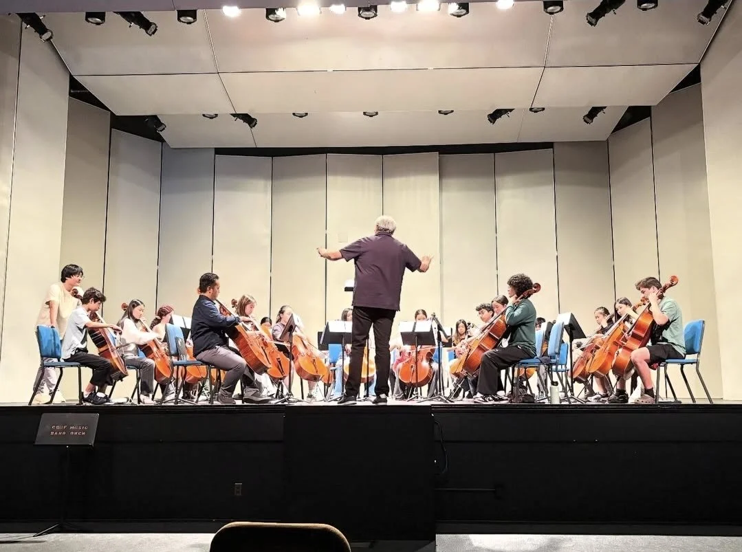 Suleiman Conducting Back .jpg