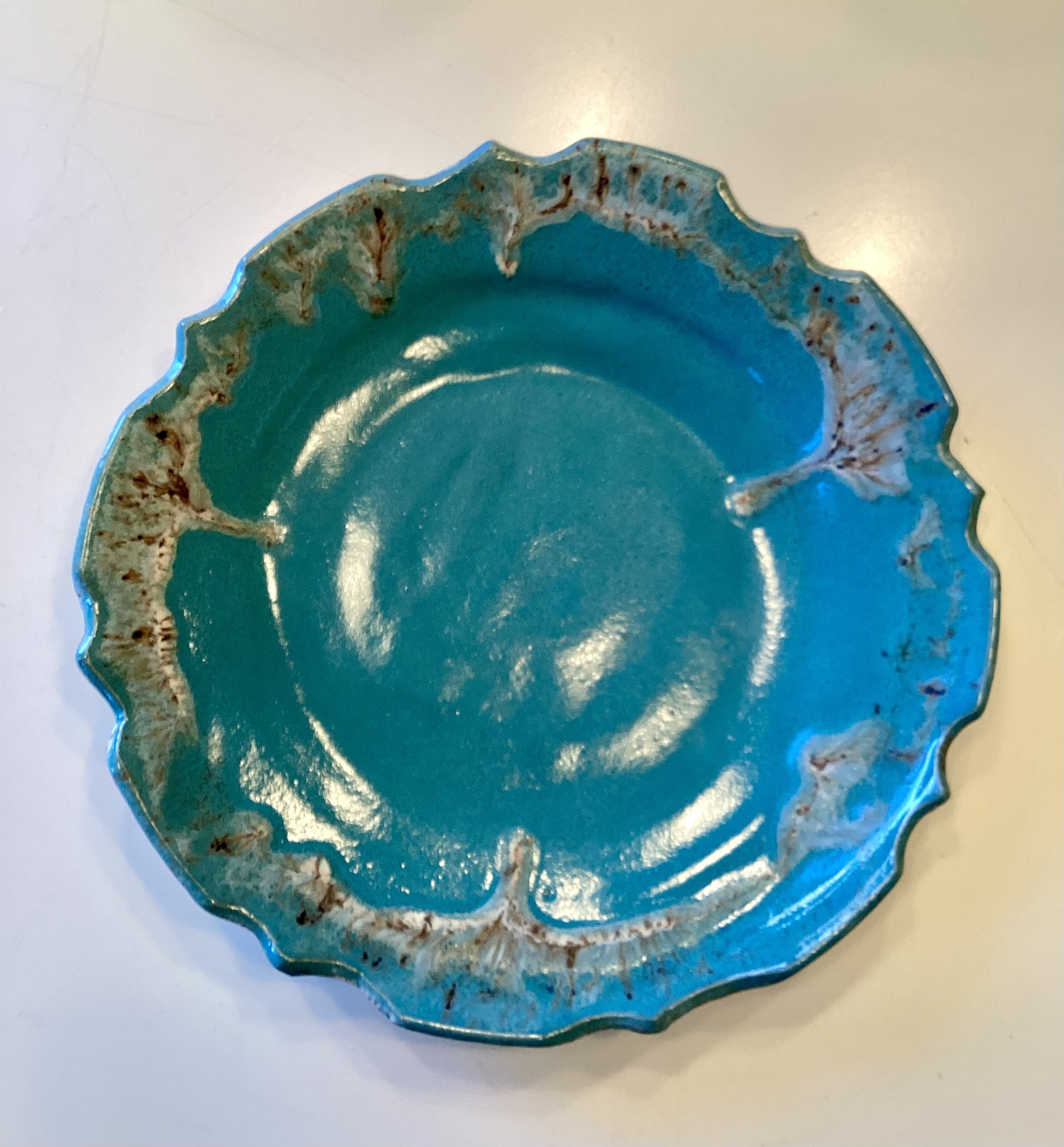 Brown splashes teal platter