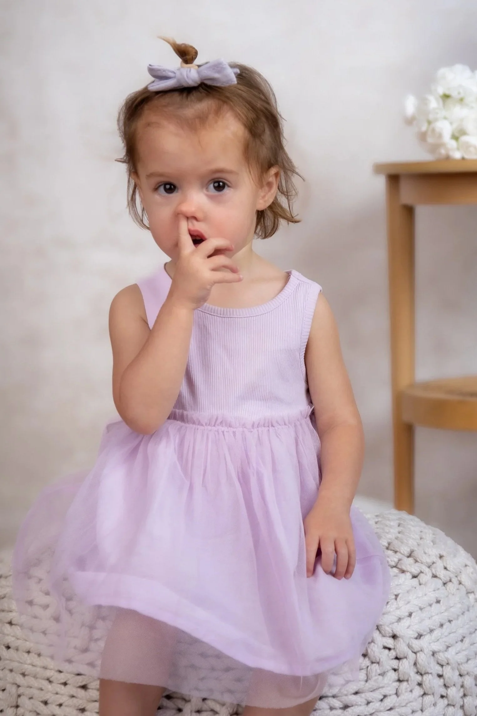 Toddler photographed against a soft backdrop during a preschool portrait session in Westlake Village
