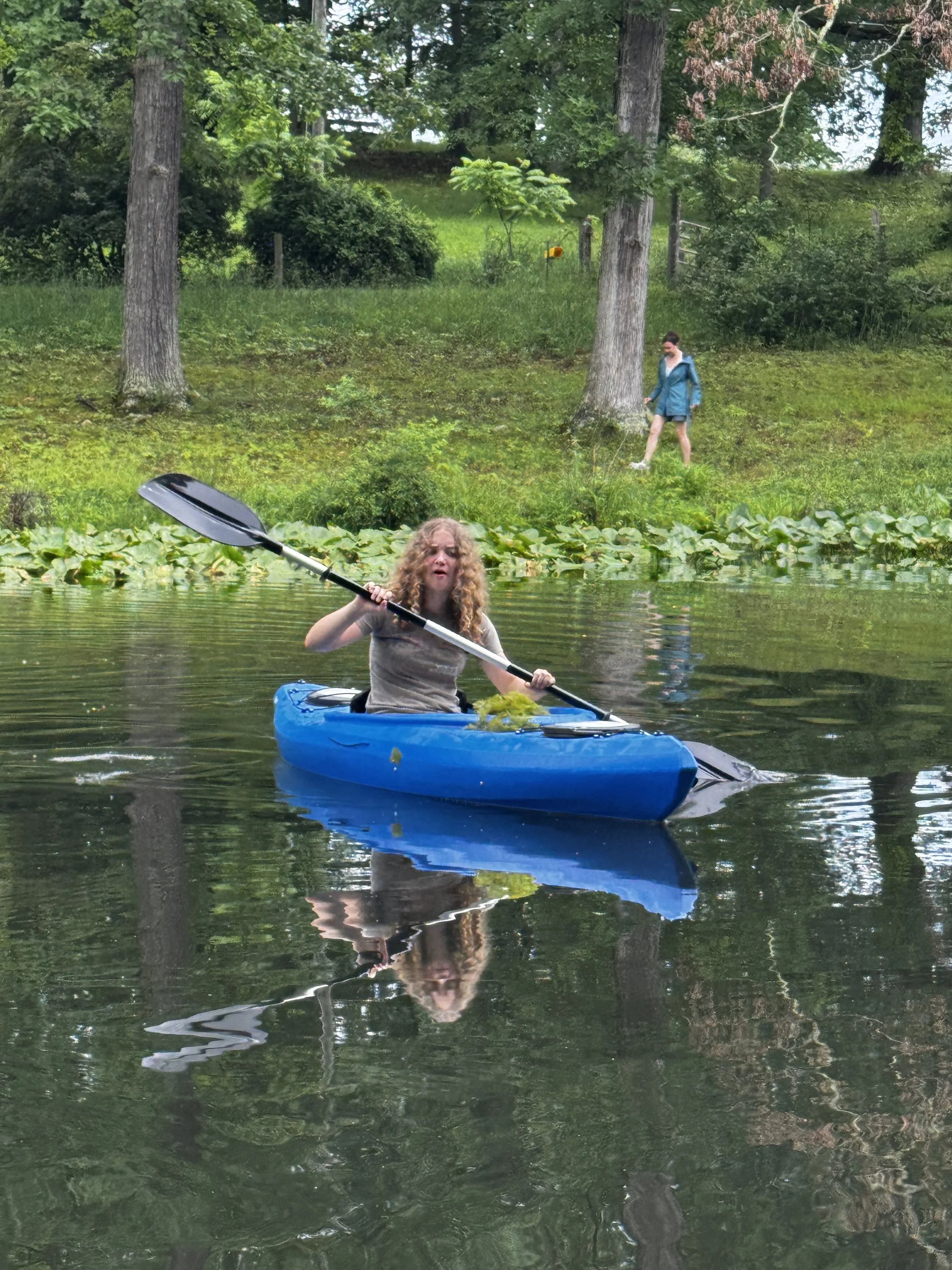 Anni in a kayak on the pond at the manor