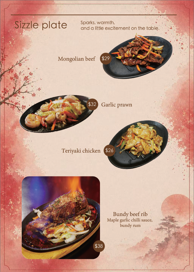 A menu page titled 'Sizzle plate' featuring four dishes: Mongolian beef priced at $29, garlic prawn priced at $32, teriyaki chicken priced at $26, and bundy beef rib with maple garlic chili sauce and bundy rum priced at $38. The page has a red and beige background with floral and mountain illustrations, and each dish is shown on a black plate with descriptive text.
