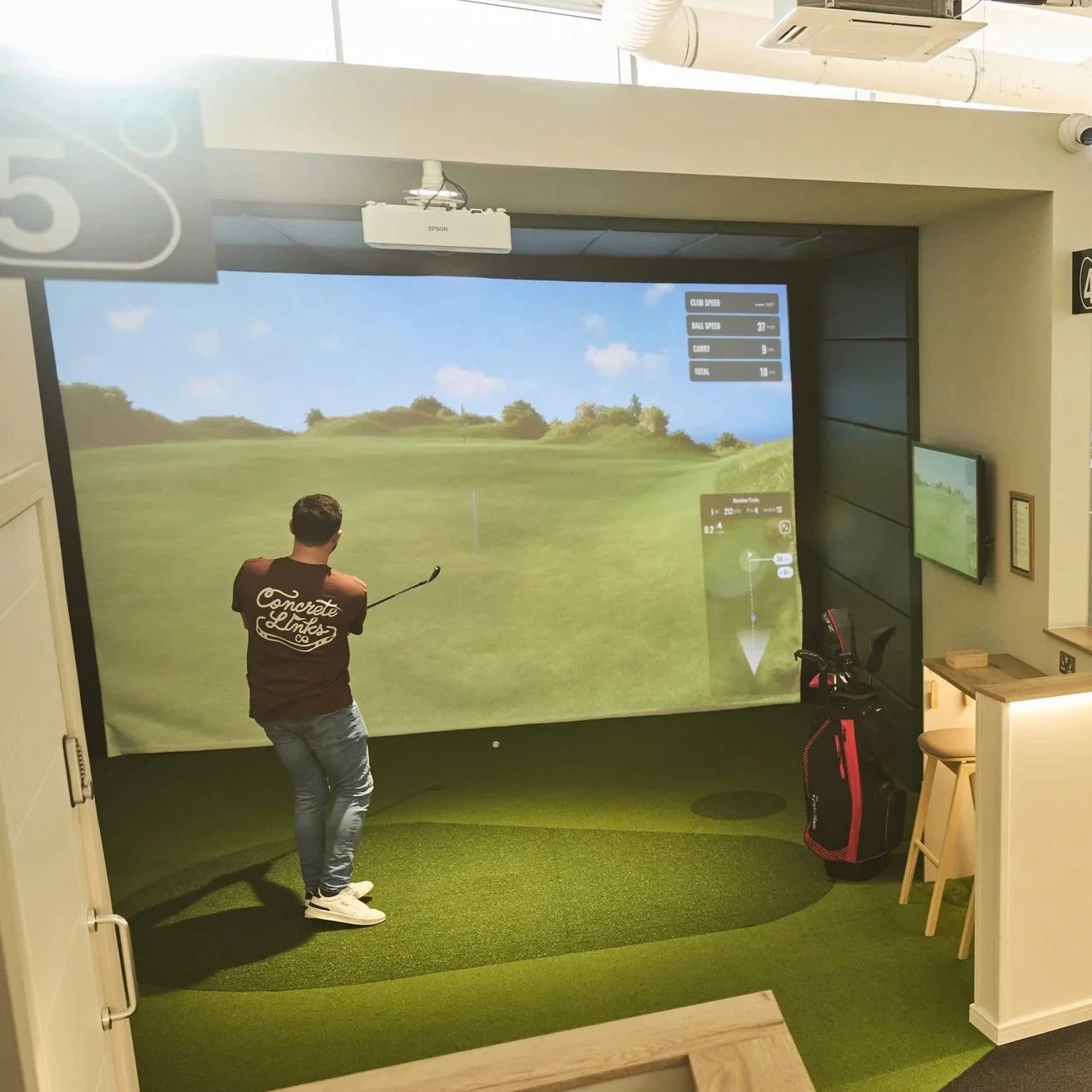 TeeClub logo in the water in front of MediaCity
