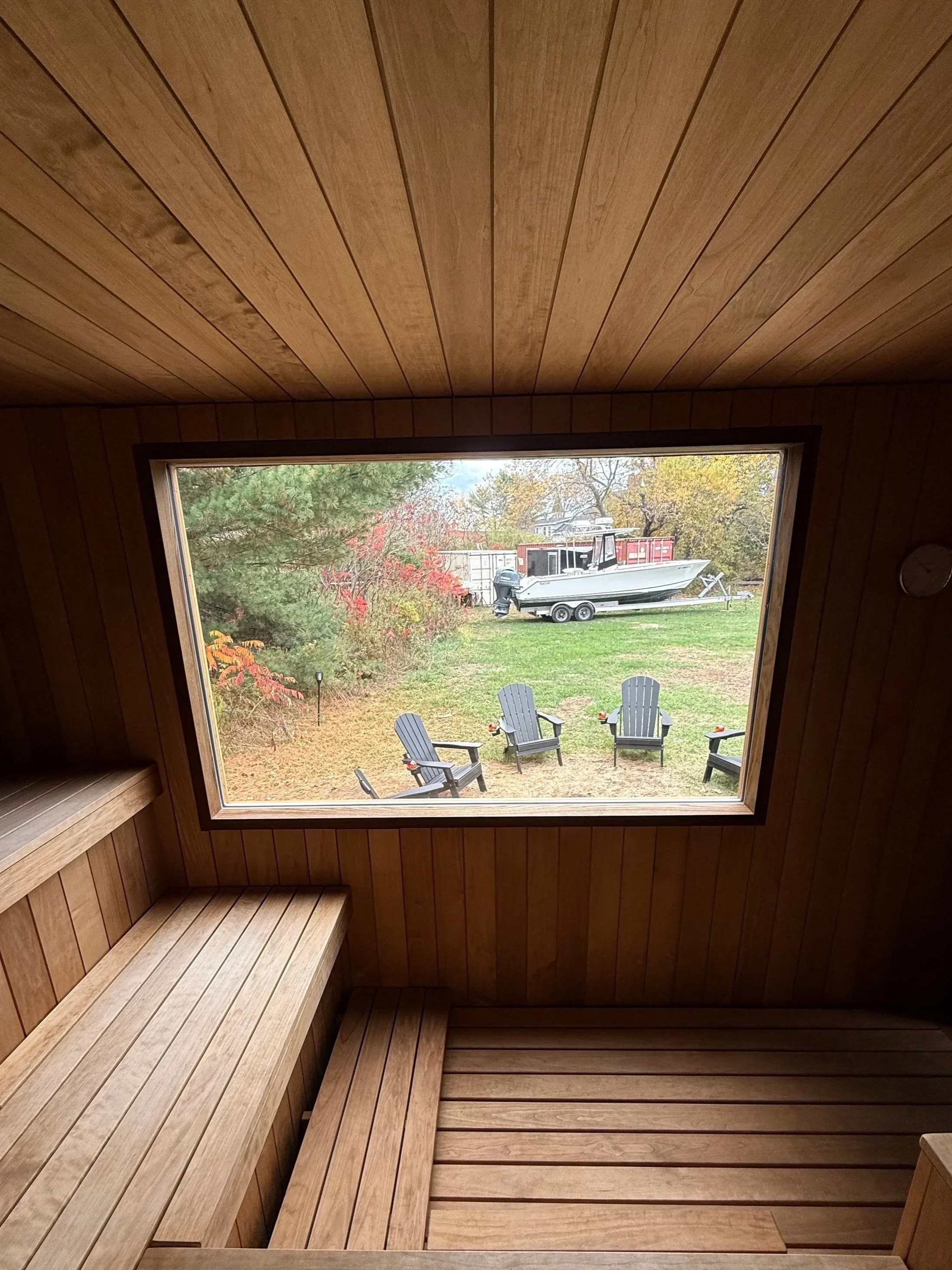 Large picture window view out of Rove Sauna in Scarborough, Maine