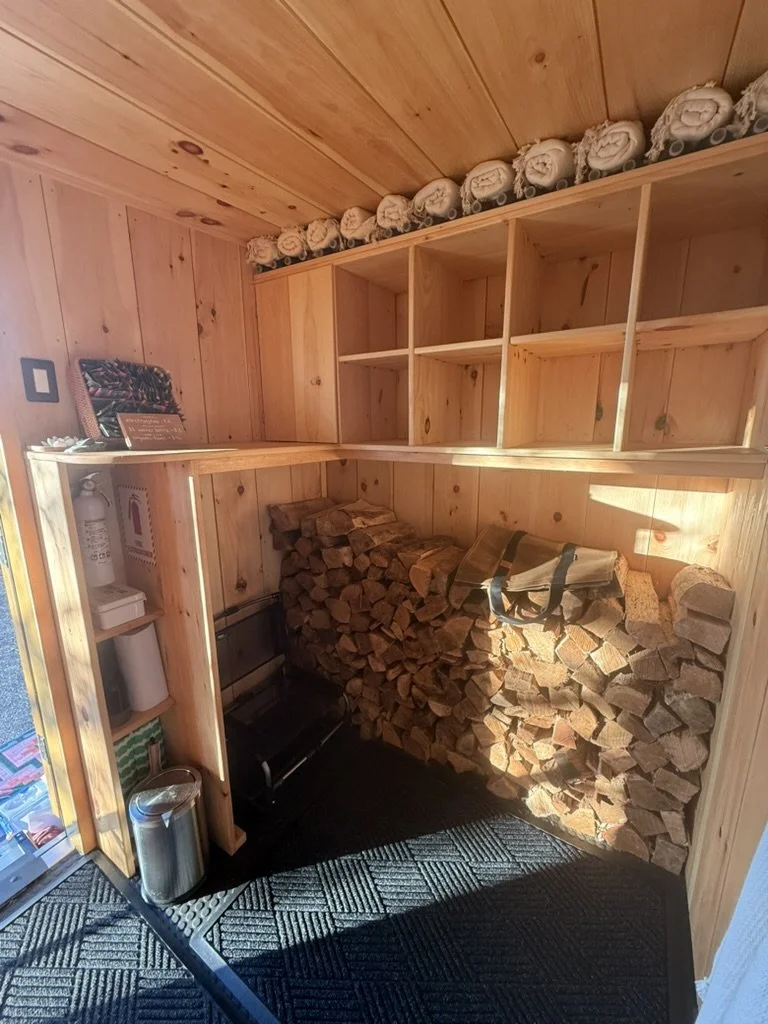 Indoor guest cubbies/storage, electrolytes, towels, and waters for sale at Rove Sauna in Scarborough, Maine