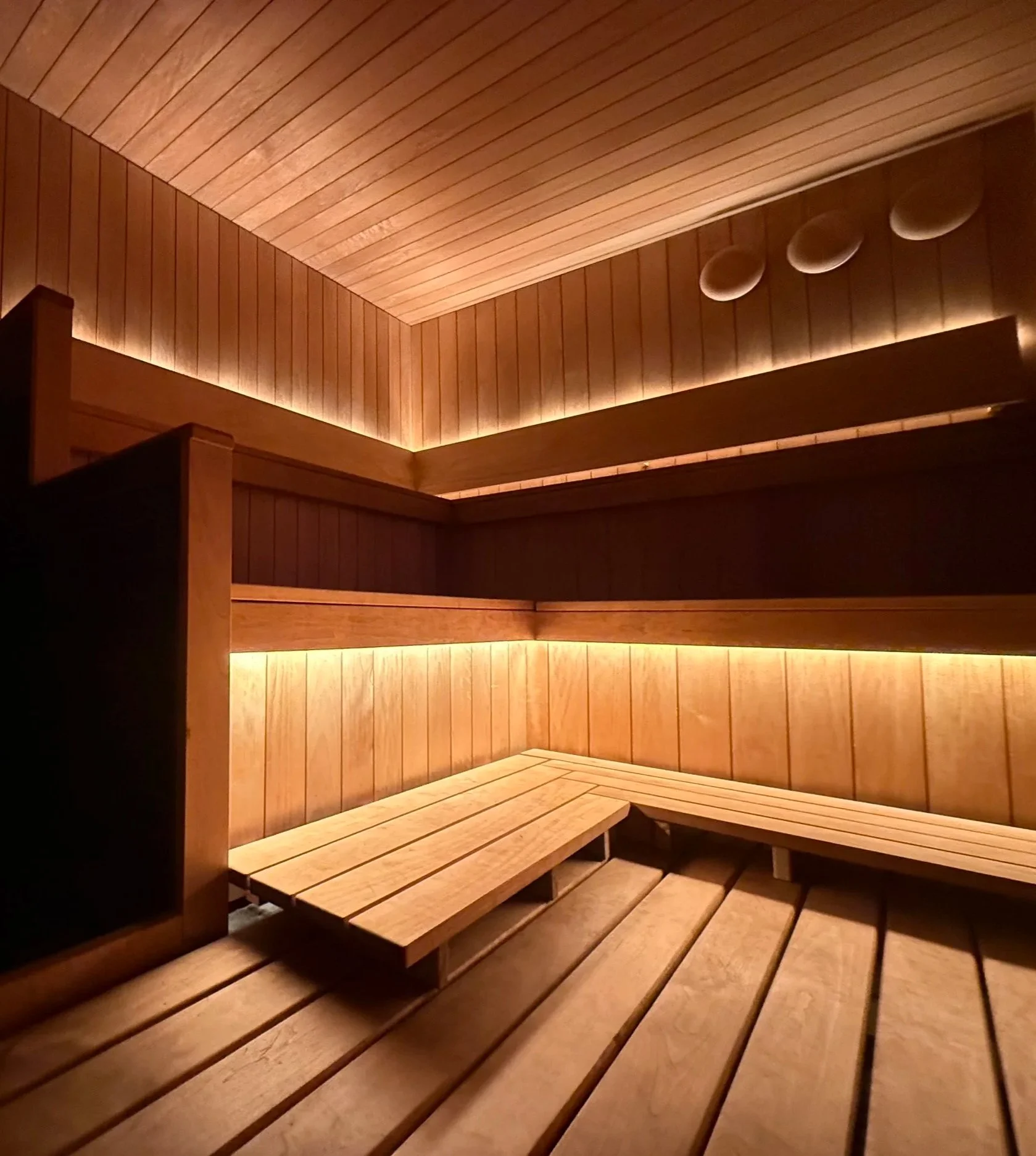 Soothing night lighting of wood-fired sauna at ROVE Sauna near Portland Maine