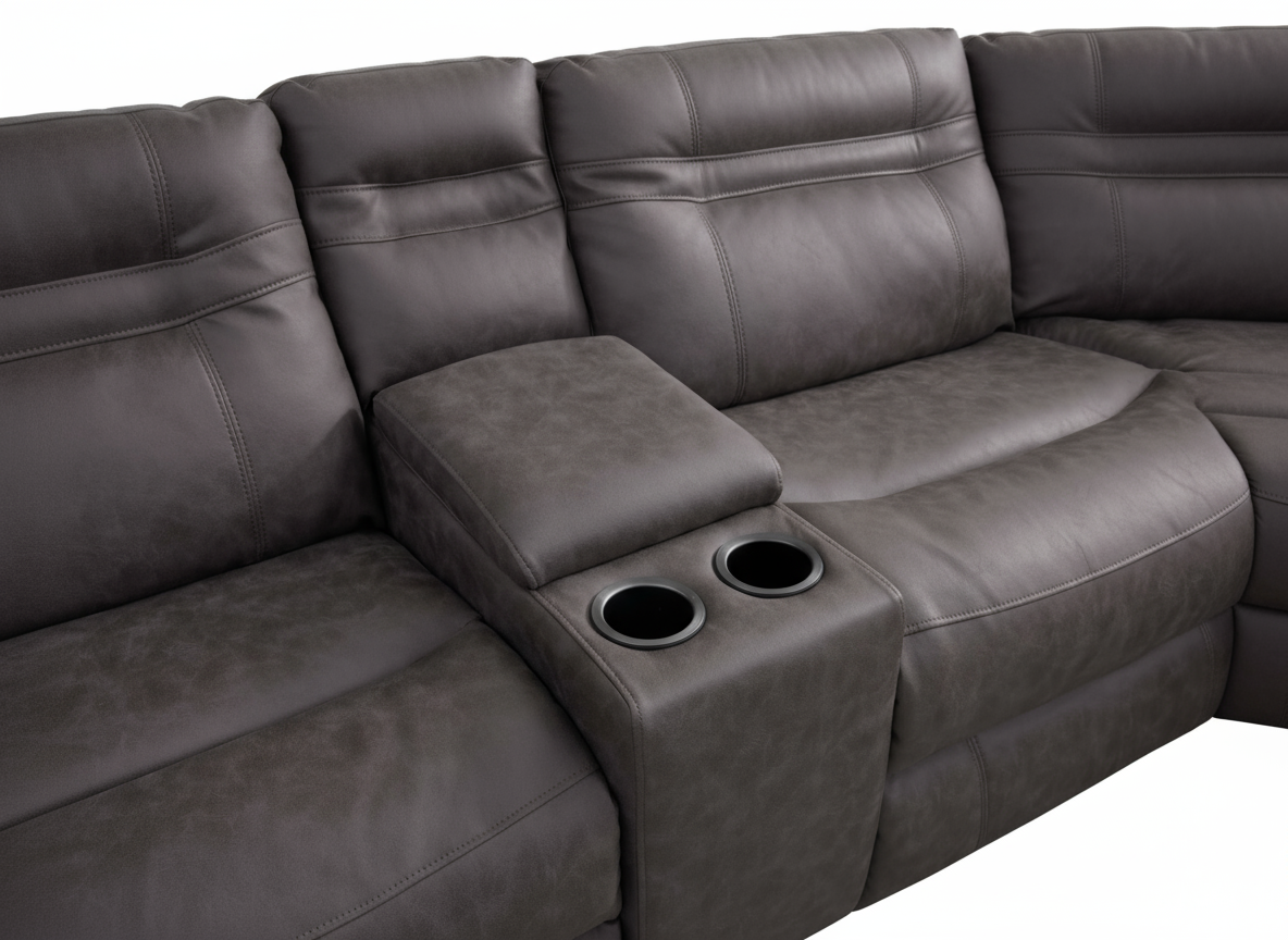 Gray leather sectional sofa with built-in cup holders in the center console.