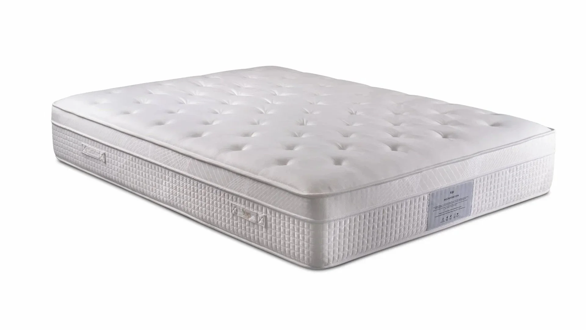 A white mattress with tufted top and quilted sides isolated on a white background.