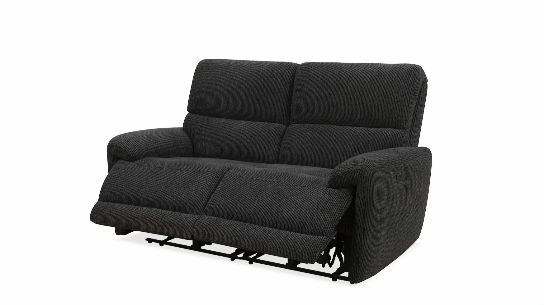 Black fabric reclining sofa with extended footrest in a studio setting