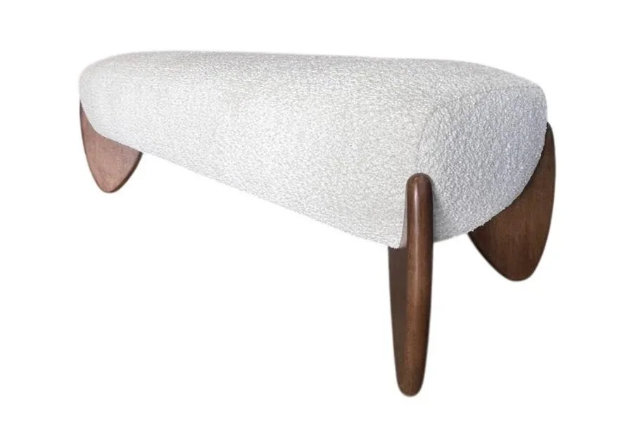 White textured ottoman with three wooden legs.