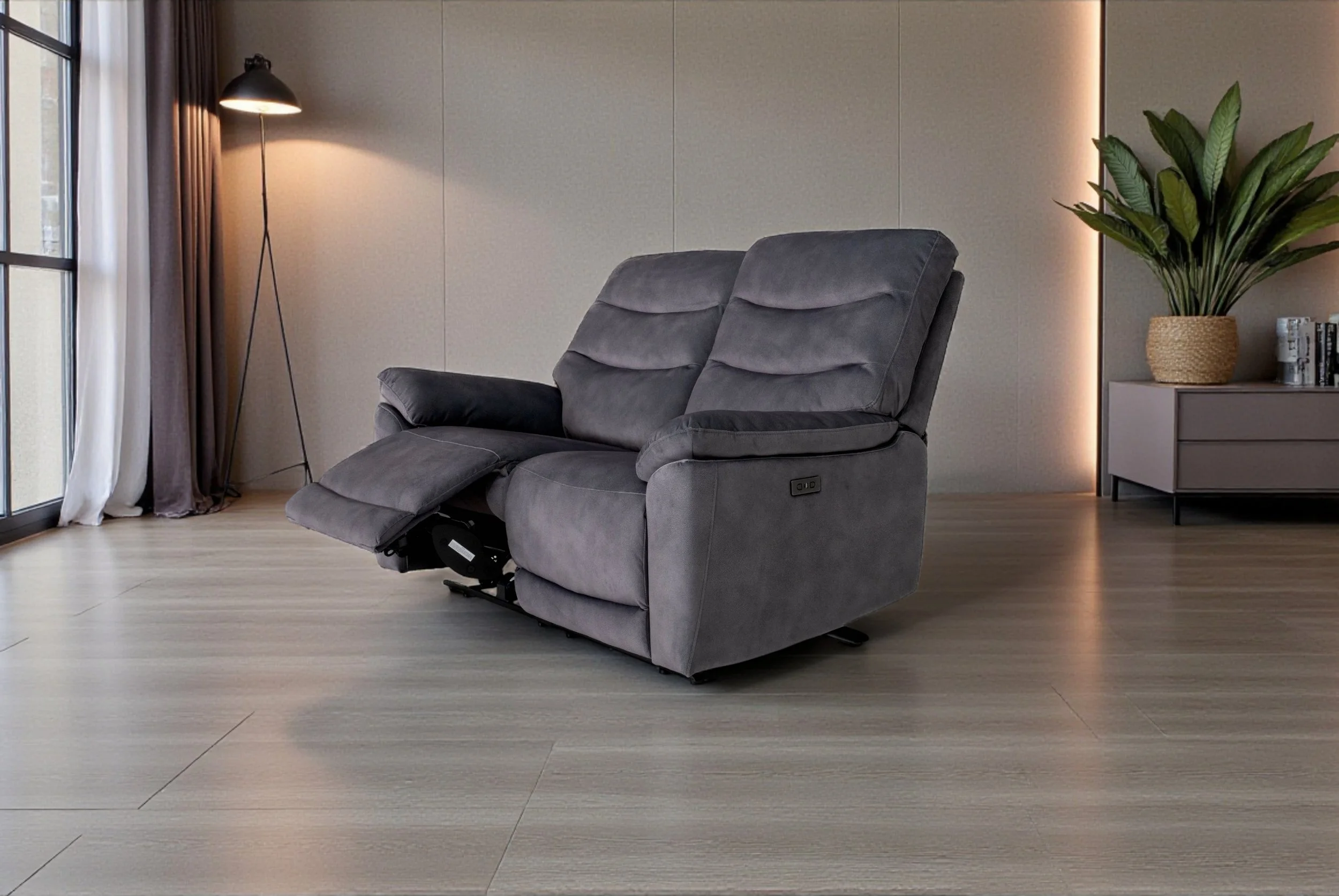 Gray fabric loveseat sofa with armrests on both sides against a plain white background.