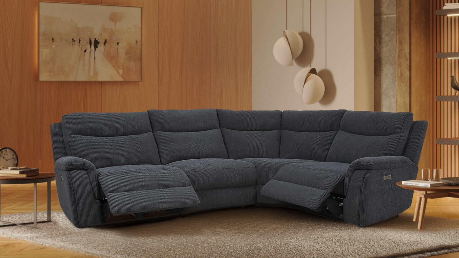 Modern living room with a large dark gray sectional sofa, a window with cityscape view, and abstract black and white art on a black accent wall.