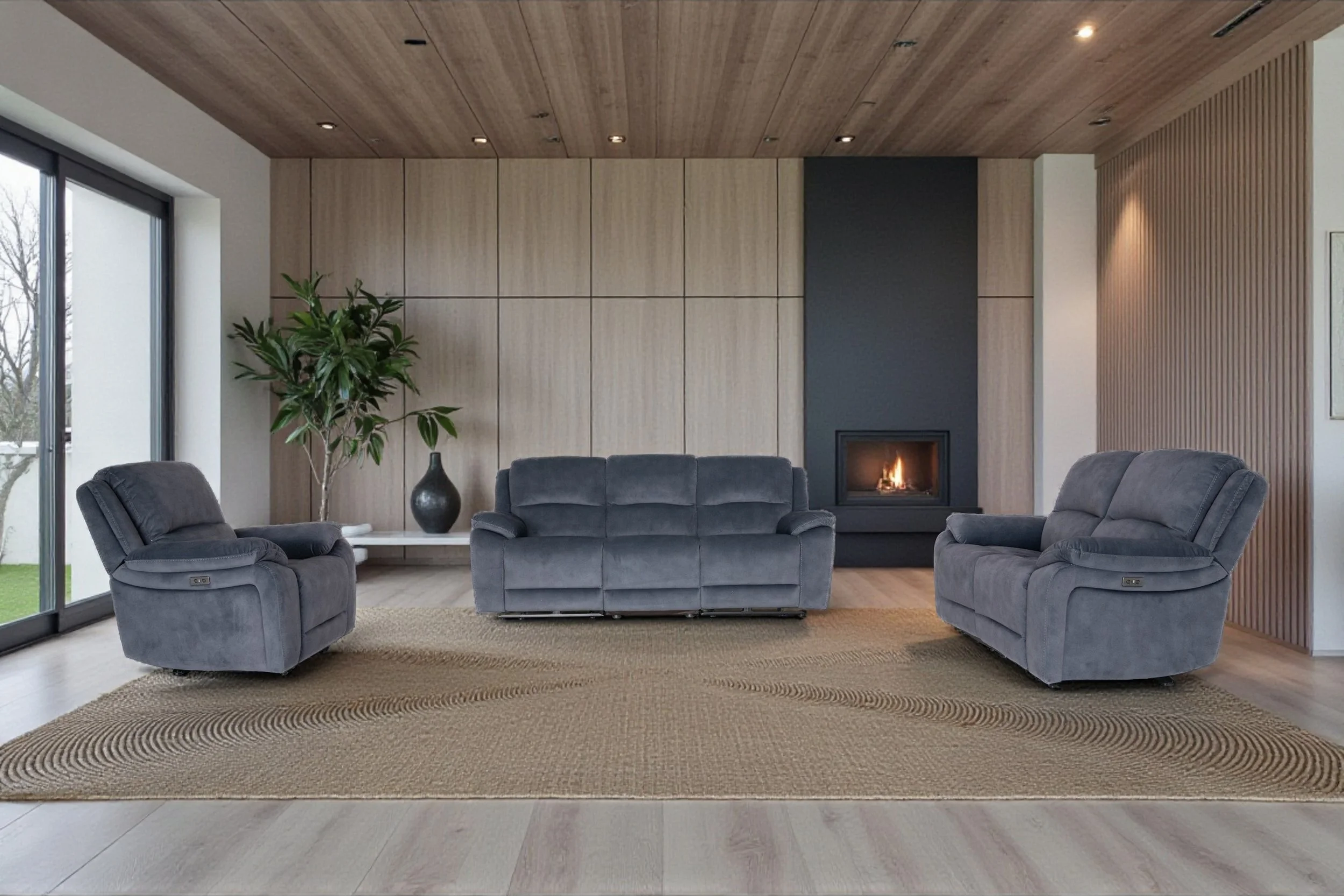 Dark gray living room sofa set consisting of a three-seat sofa and two single recliner chairs, arranged against a white background.