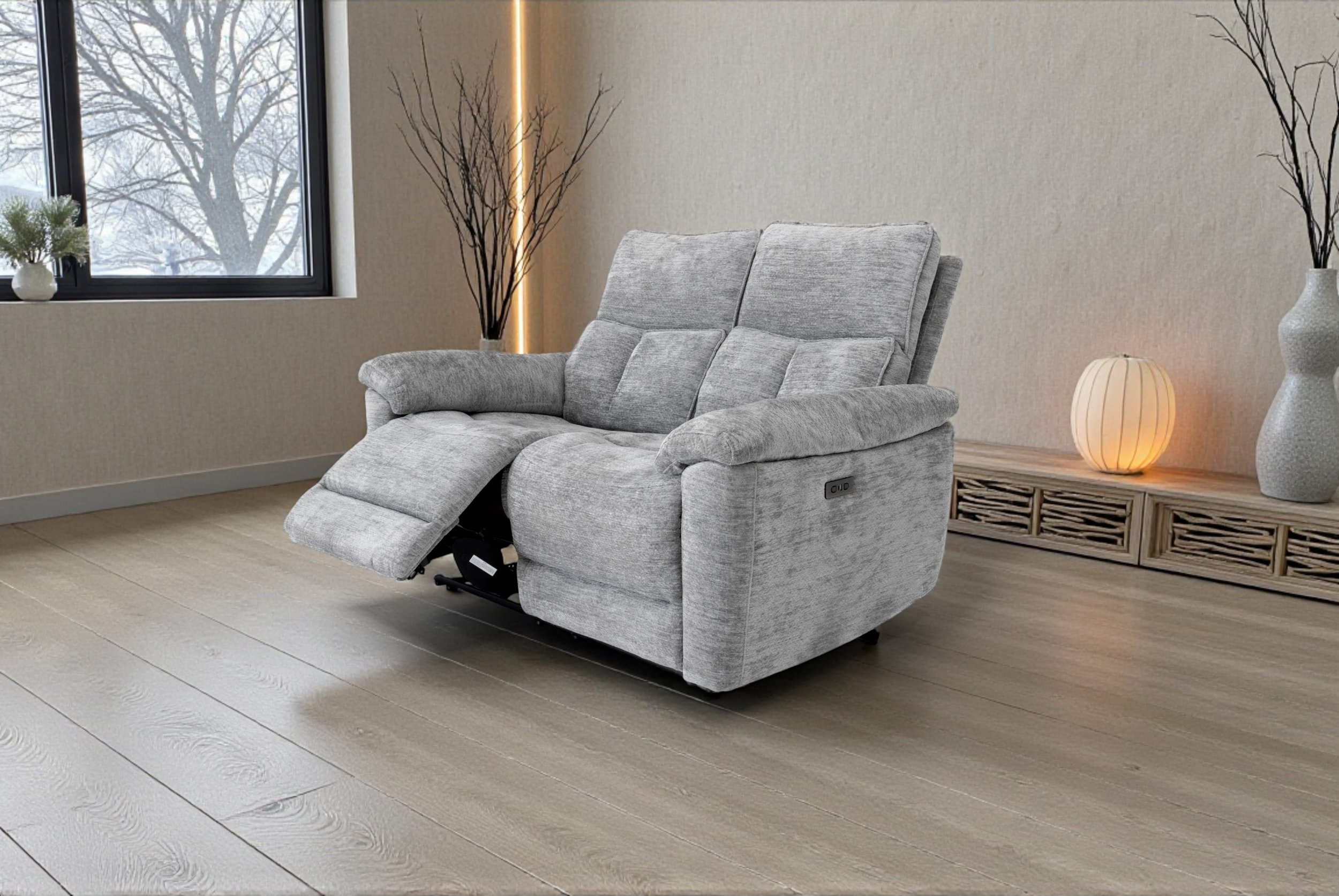 Gray fabric loveseat on a plain white background.