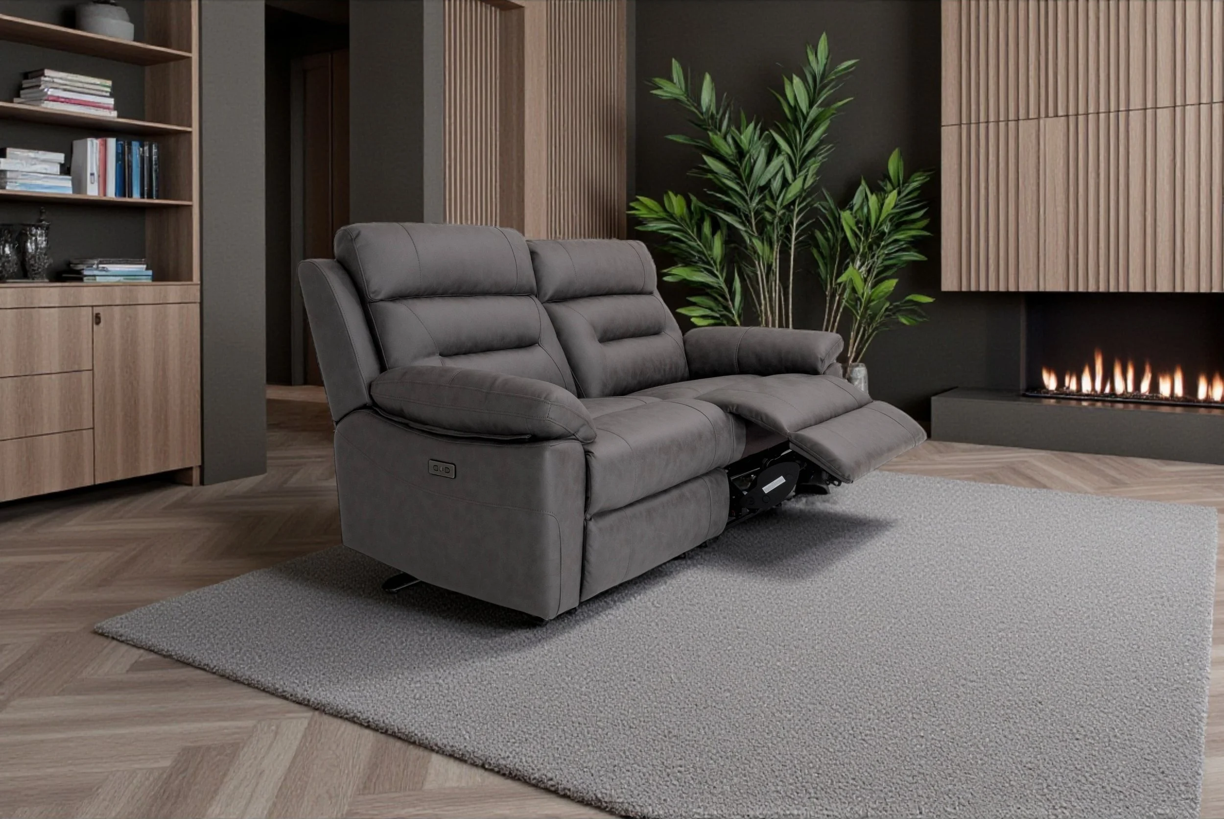 A gray leather sofa against a plain white background.