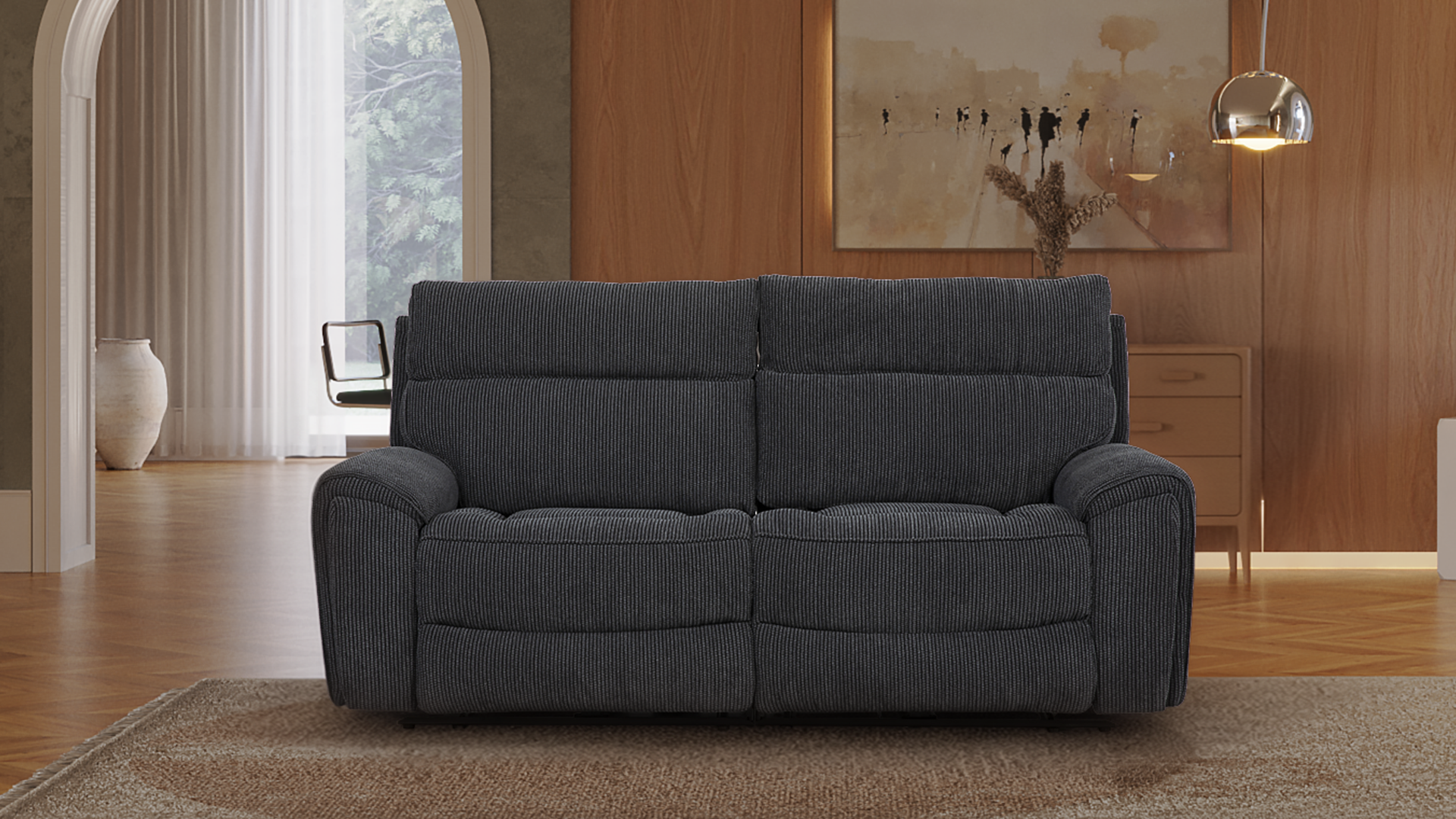 Living room with a gray sofa, wooden accent wall, arched doorways, a framed landscape painting, a floor lamp with a curved arm, and a beige area rug.