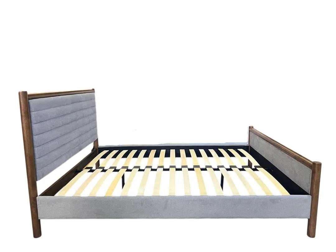 Gray upholstered modern bed frame with wooden legs, no mattress
