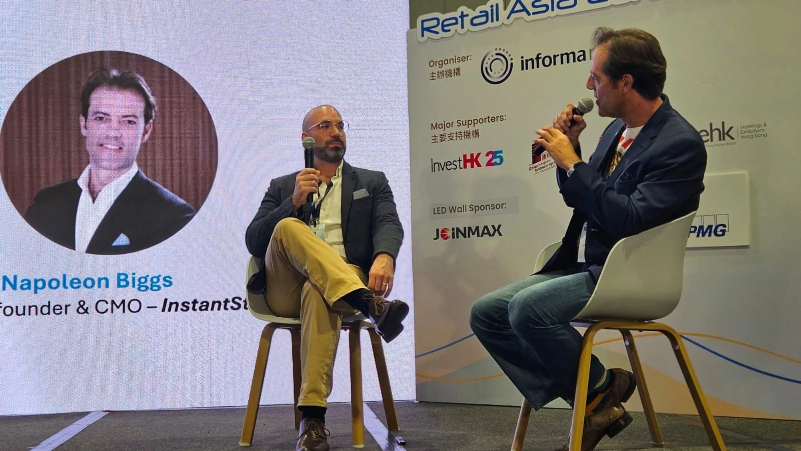 Mark Francis (Founder & CEO, left) at the Retail Asia Conference, Technology Fireside Chat (September 2025) with Napoleon Biggs.