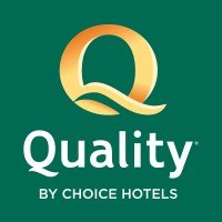 Quality by Choice Hotels logo with a large gold letter Q on a green background.