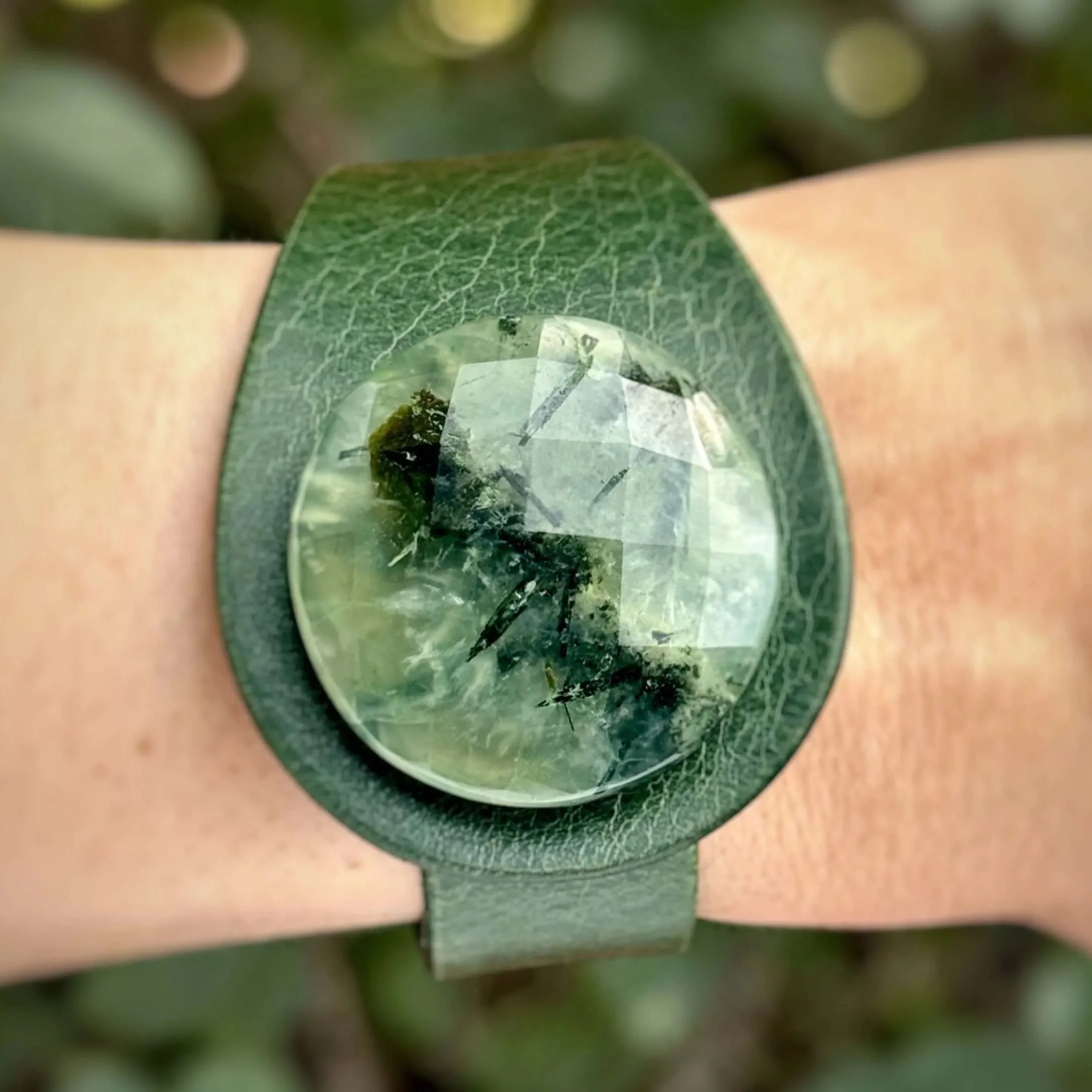 Natural-prehnite-green-leather-bracelet-on-wrist.jpg