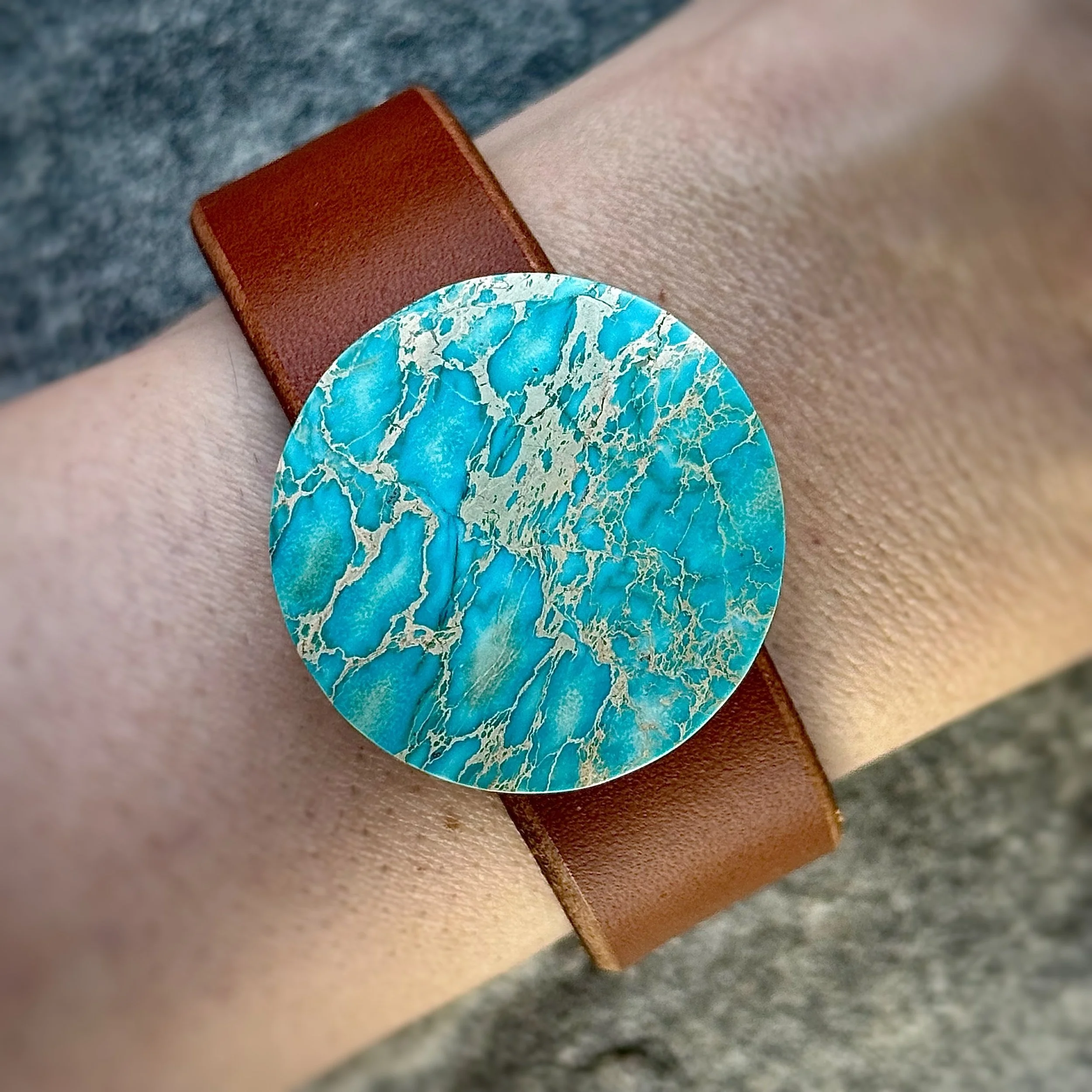 natural-sea-sediment-jasper-brown-leather-bracelet-on-wrist.jpg