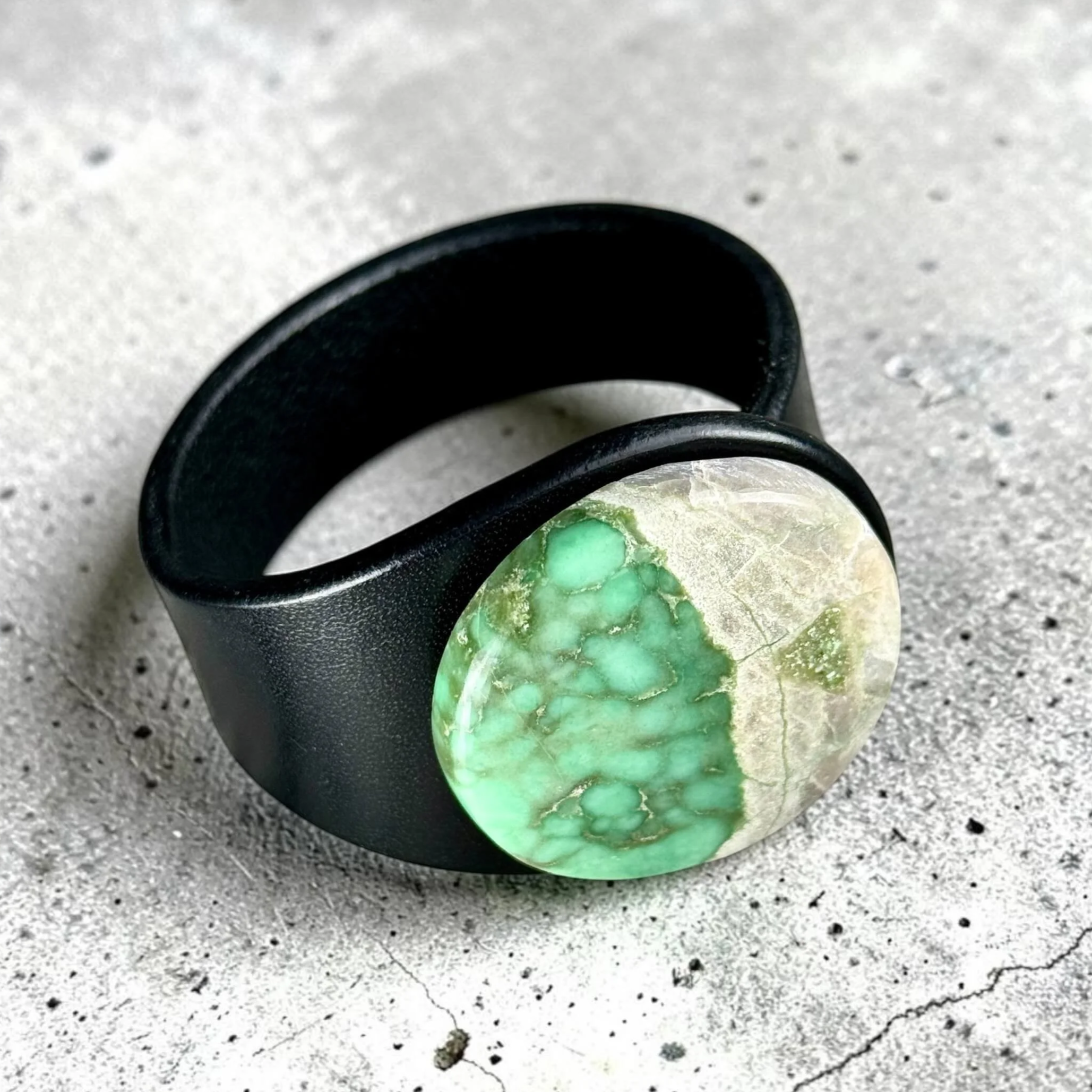 natural-variscite-black-leather-bracelet-on-side-view-by-freak-like-me.png