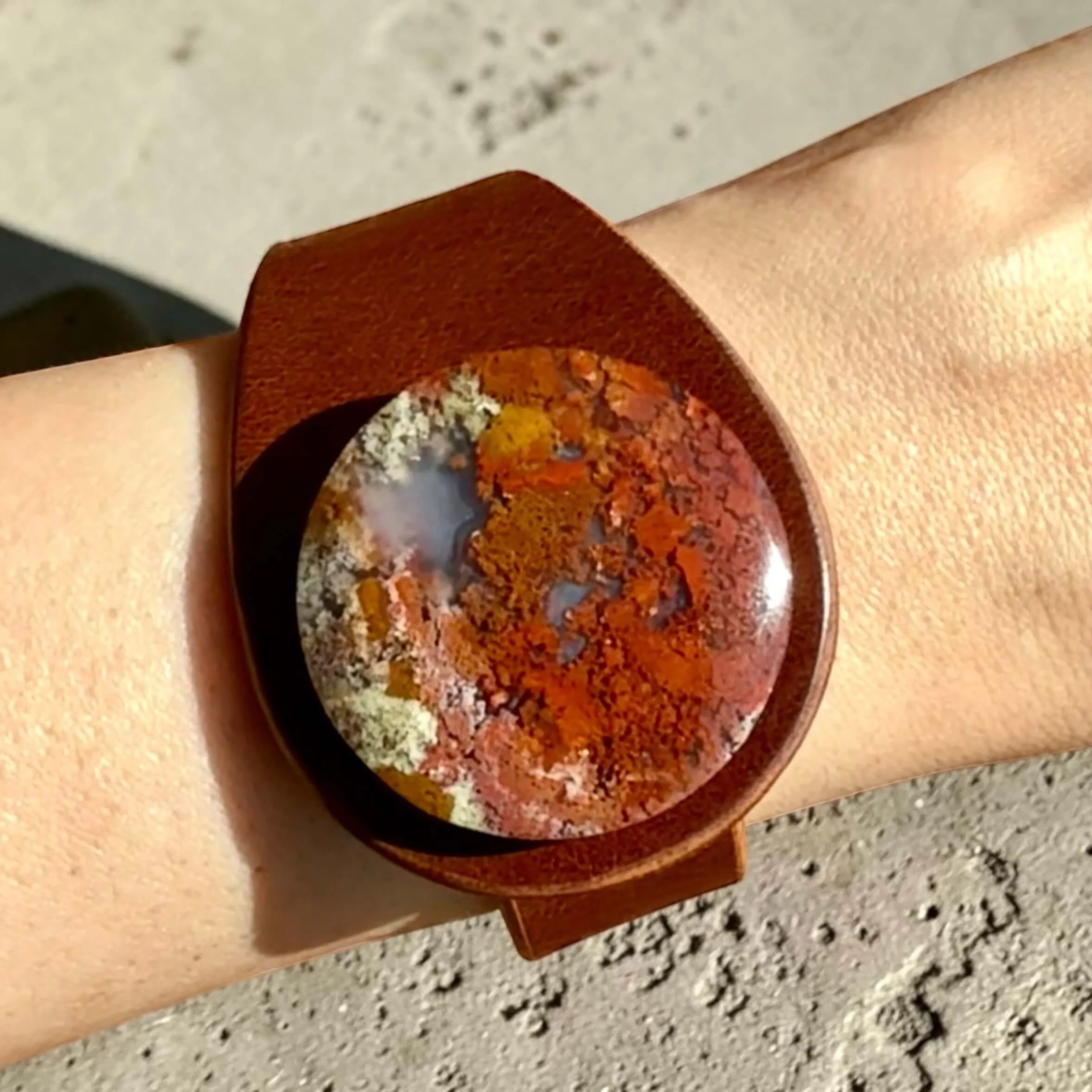 natural-scenic-moss-agate-brown-leather-bracelet-on-wrist.jpg