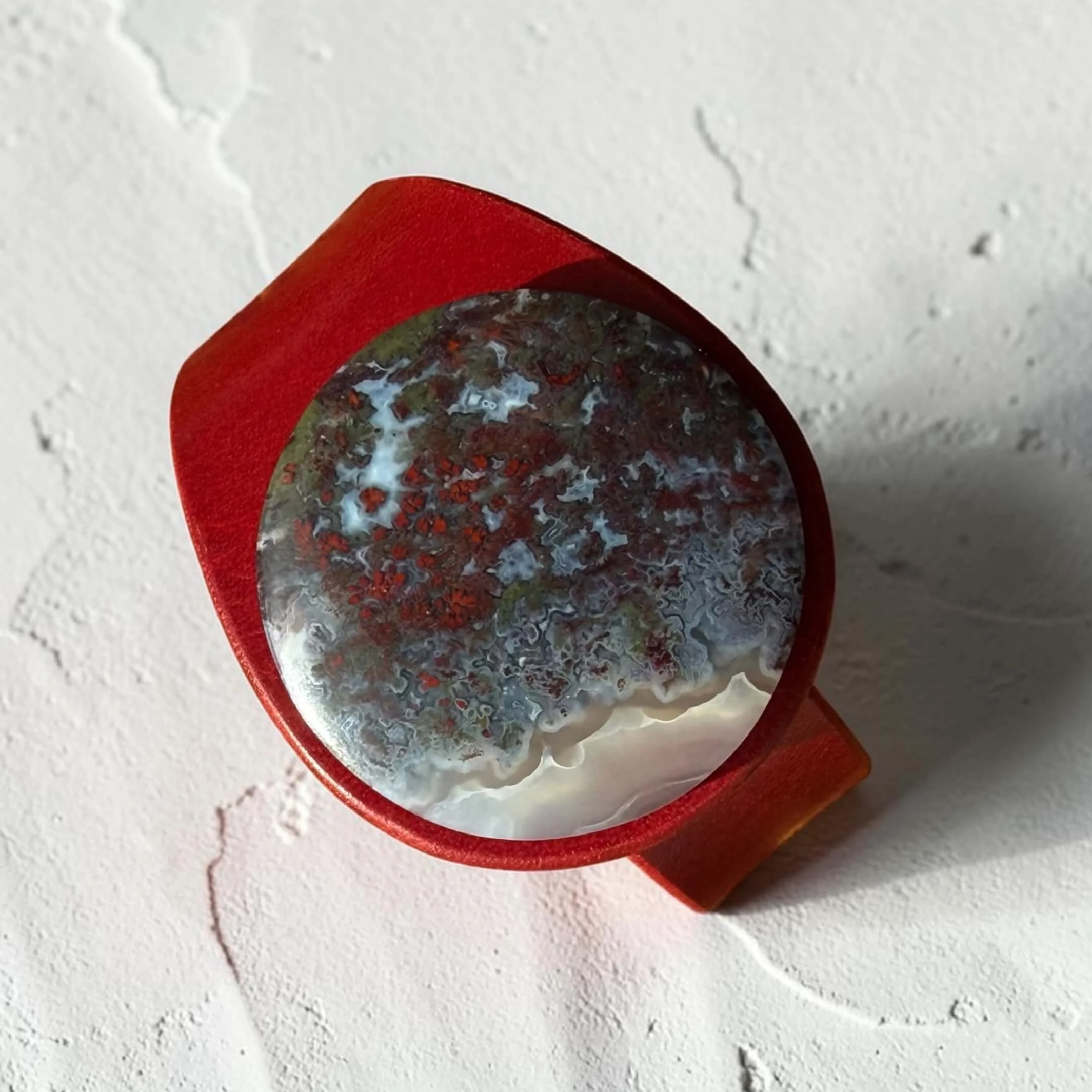scenic-moss-agate-red-leather-bracelet-from-above.png