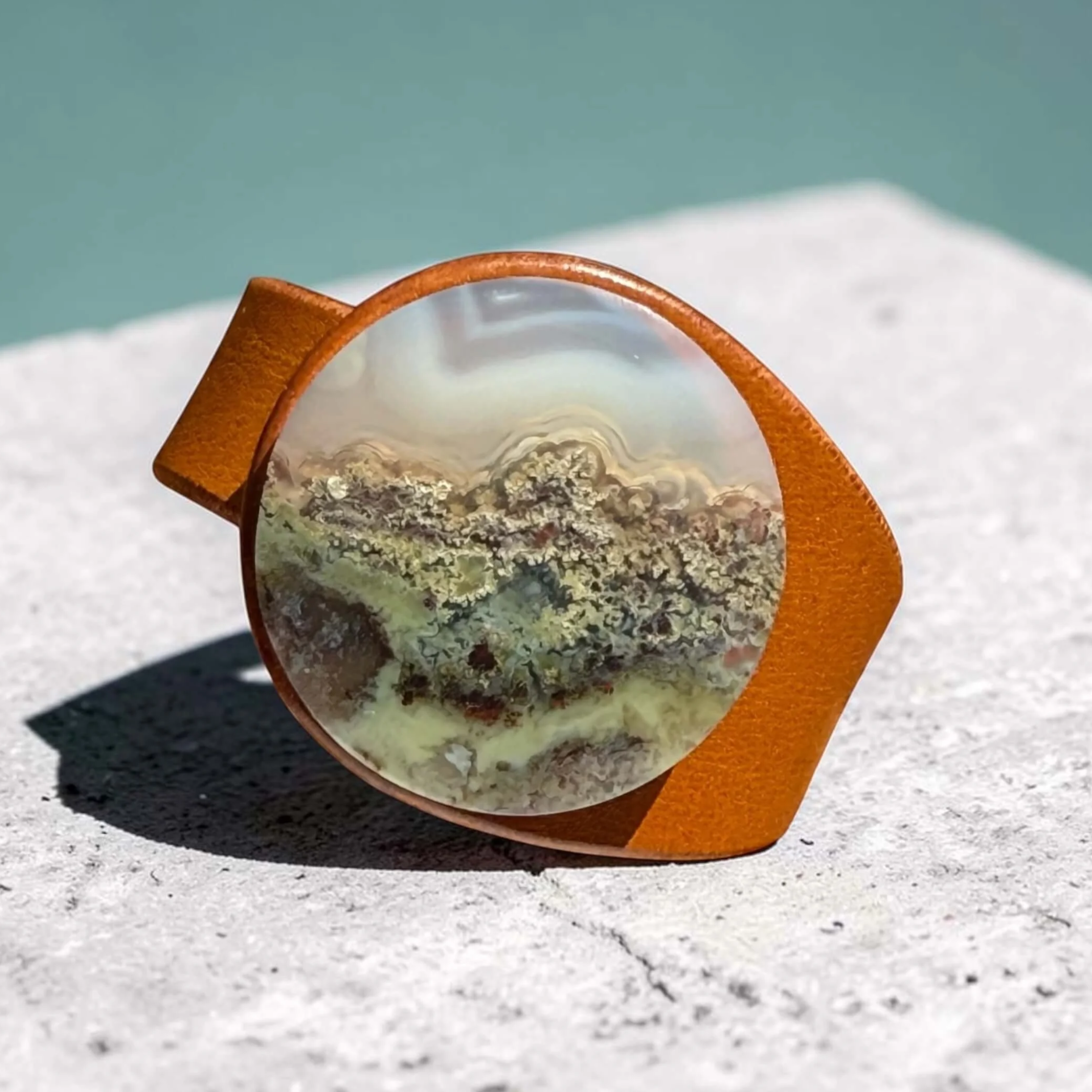 natural-scenic-moss-agate-tan-leather-bracelet-from-above.png