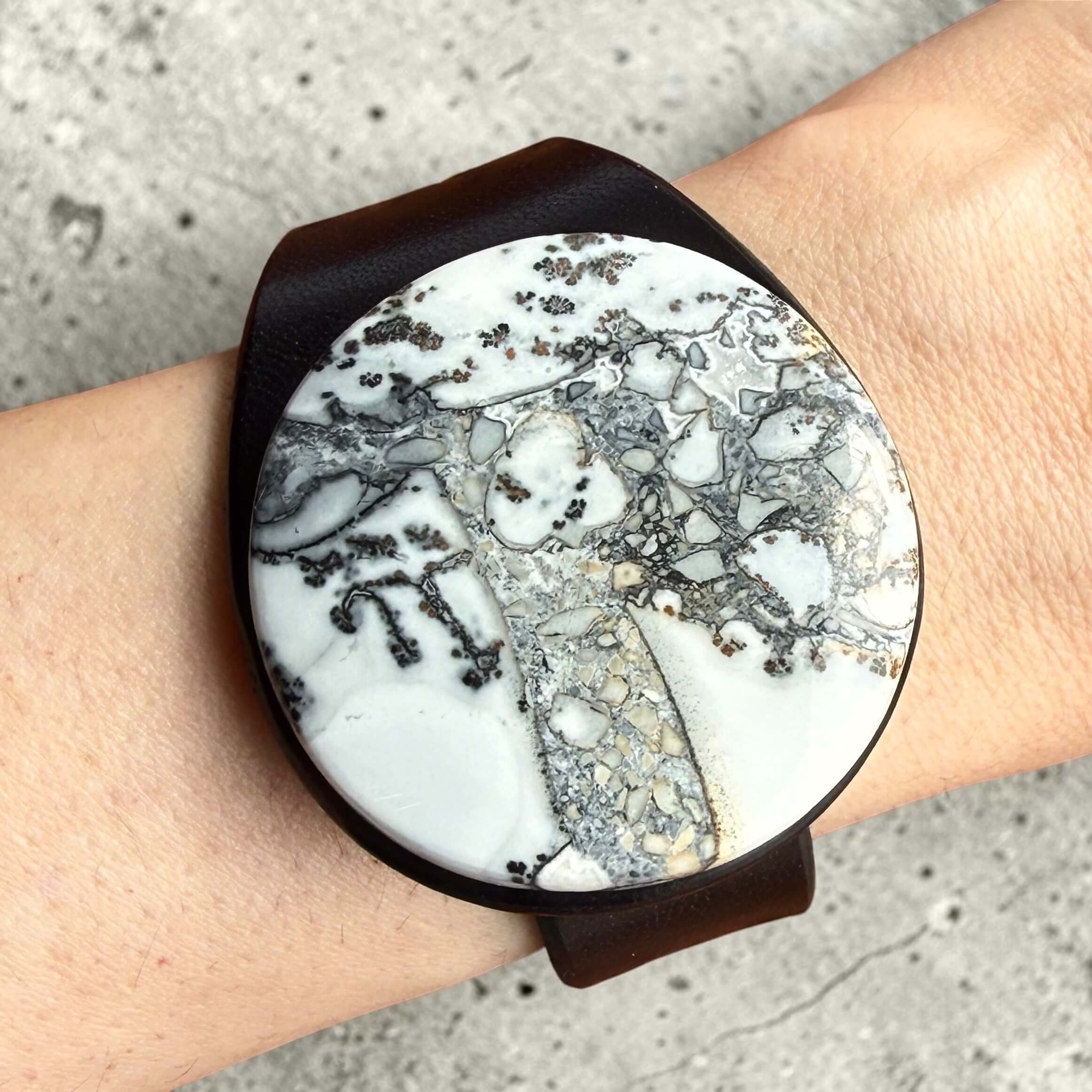 Natural-maligano-jasper-black-leather-bracelet-on-wrist.JPG