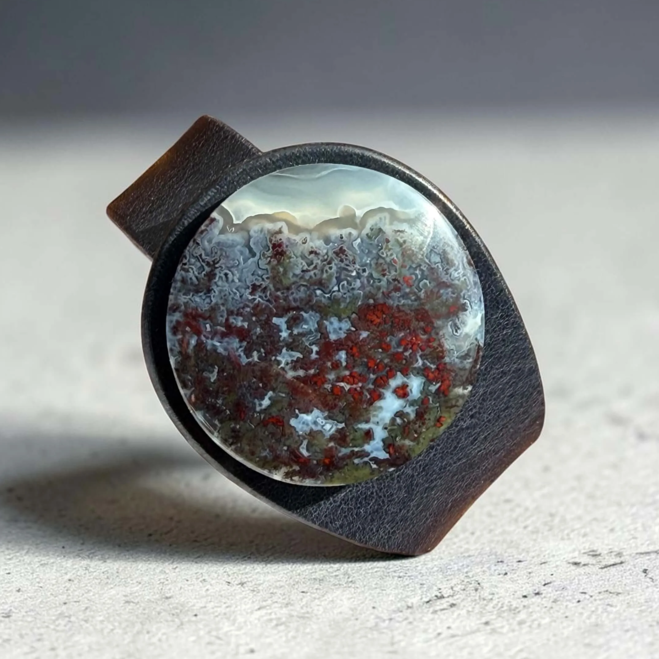 scenic-moss-agate-black-leather-bracelet-from-above.png