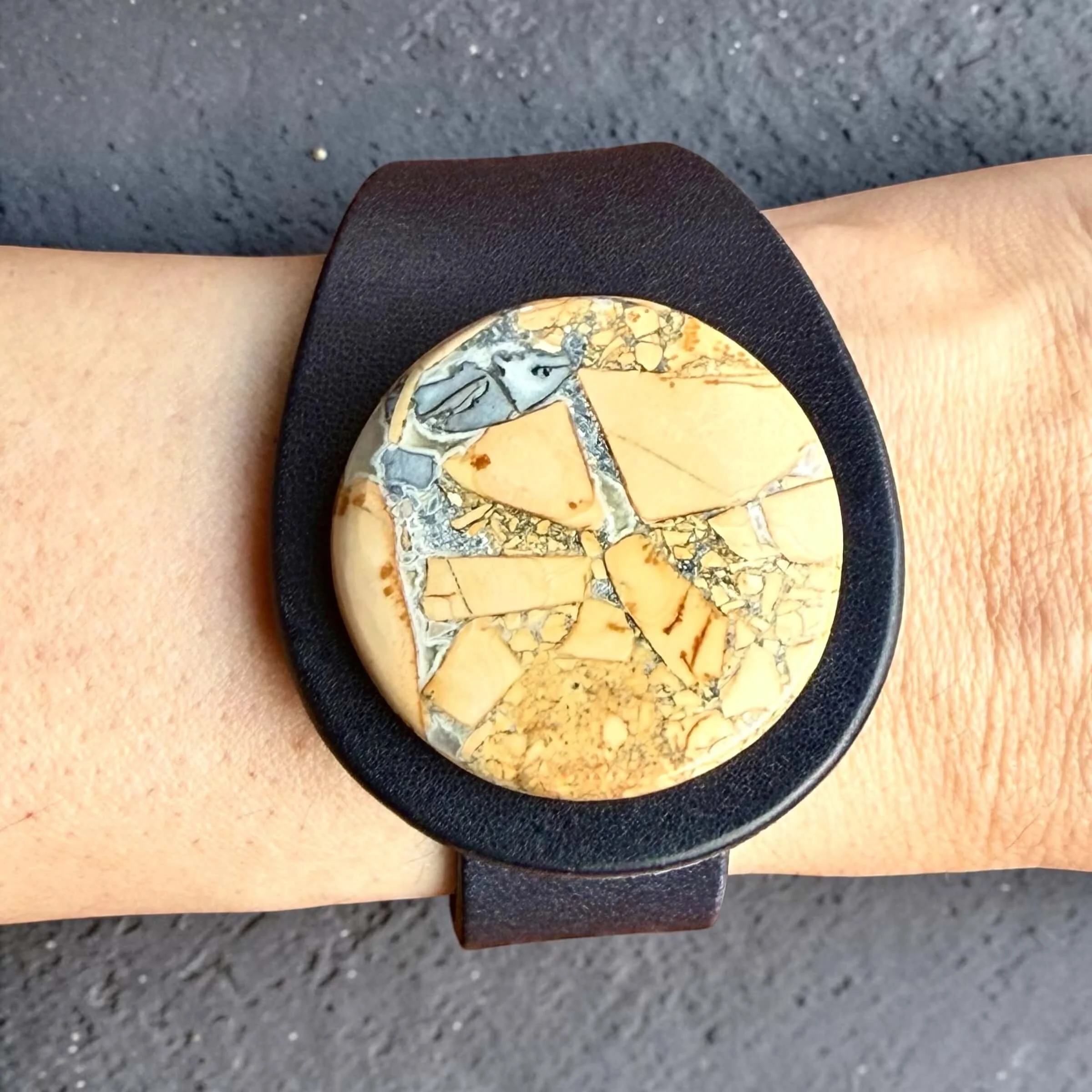 Natural-maligano-jasper-blue-leather-bracelet-on-wrist.jpg