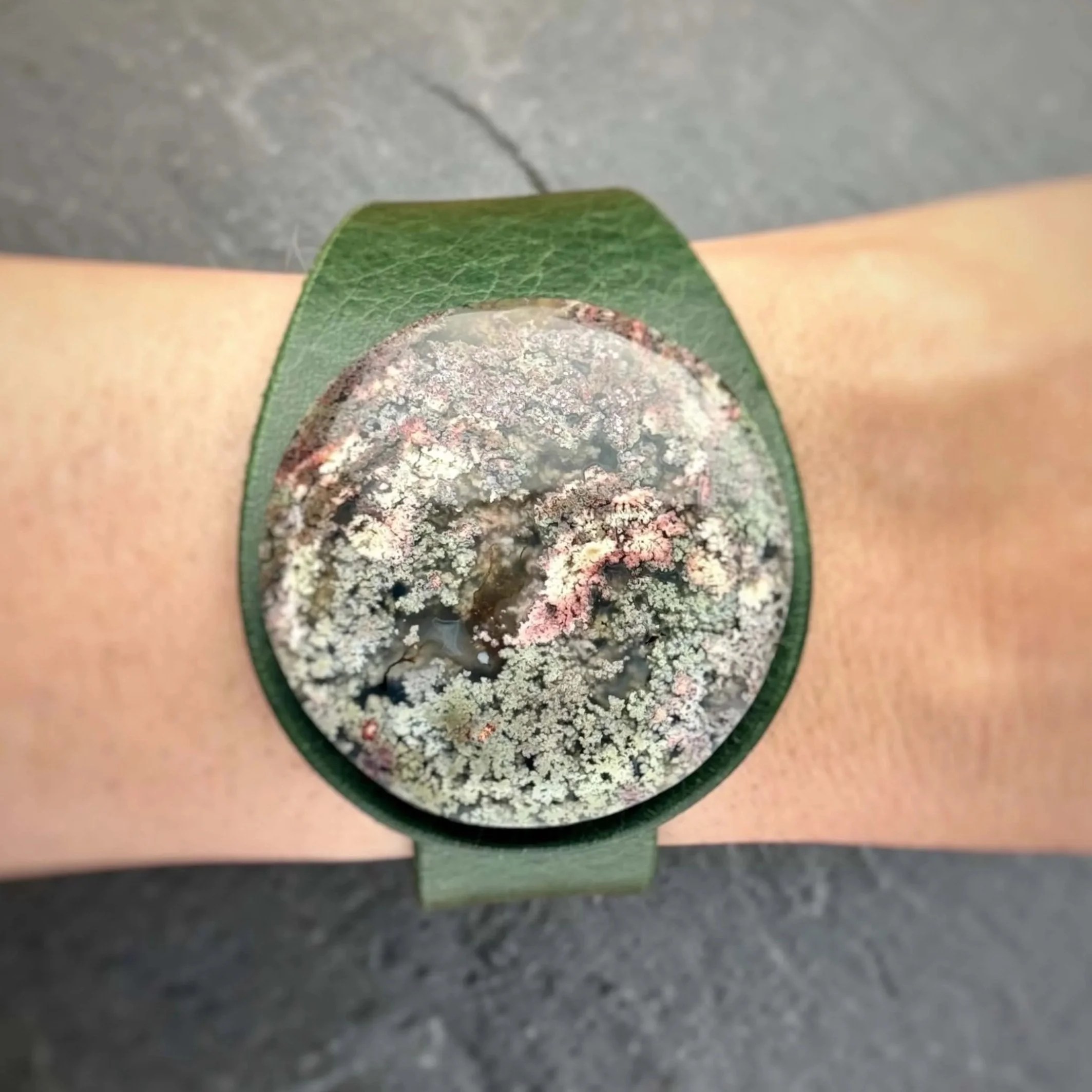 natural-scenic-moss-agate-green-leather-bracelet-on-wrist.jpg